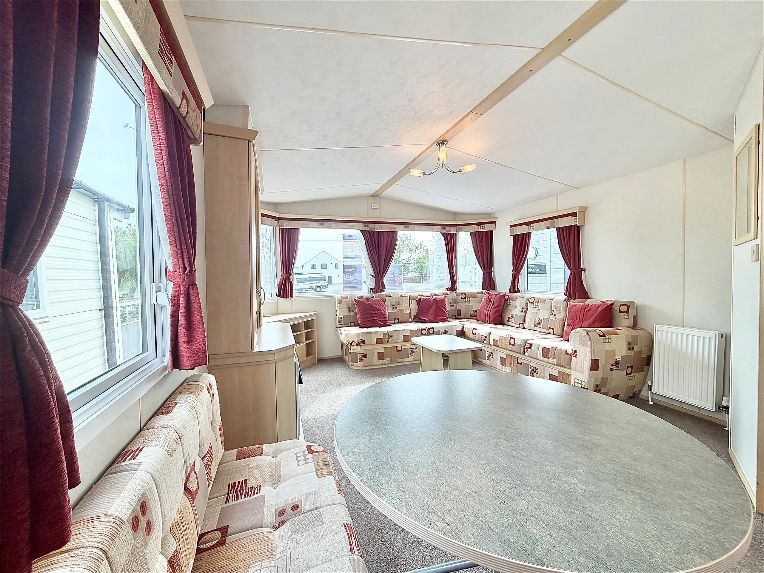 Dining area inside the 2008 ABI Roselle holiday home