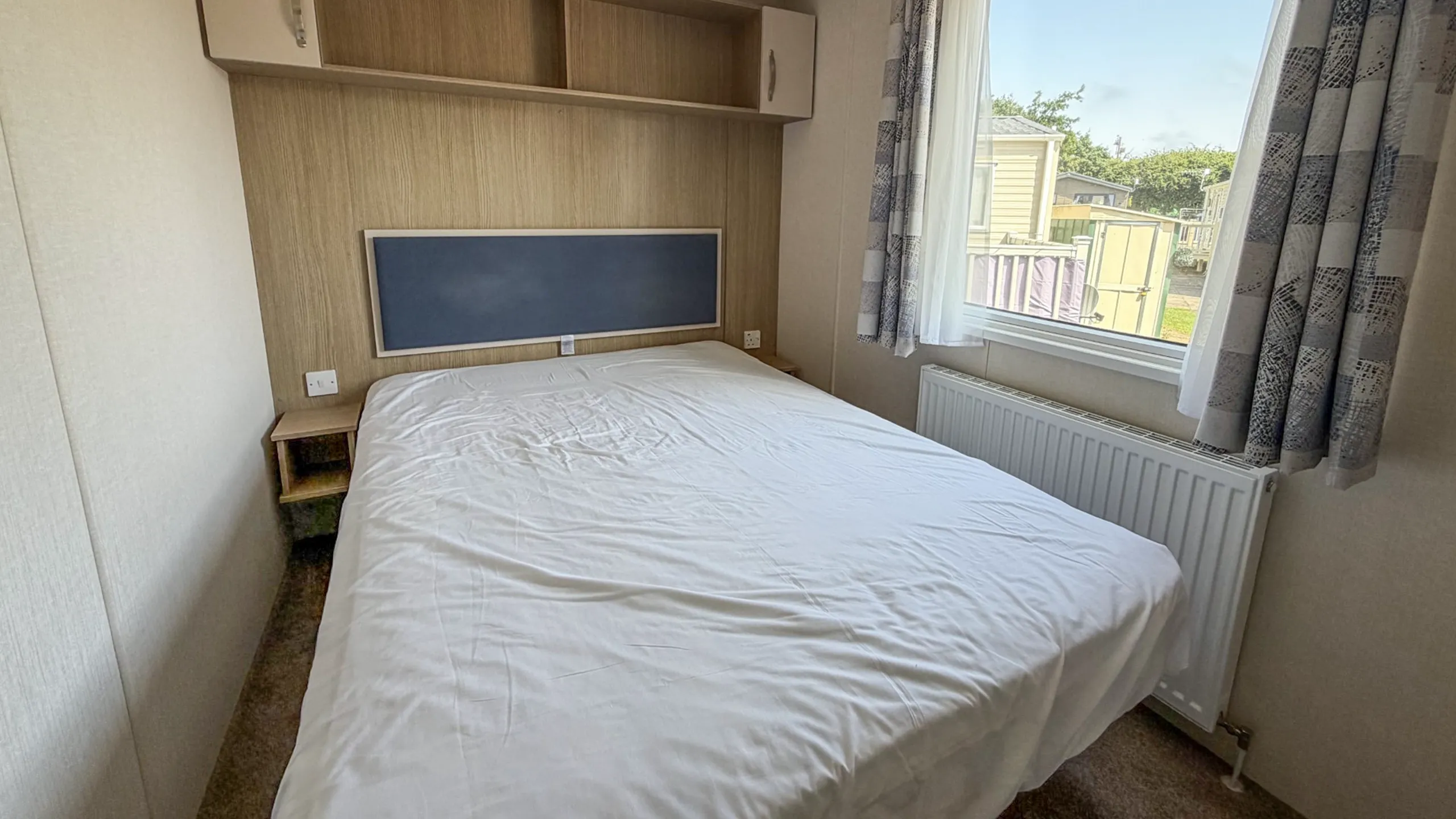main bedroom with over bed shelving in 2018 victory echo 
