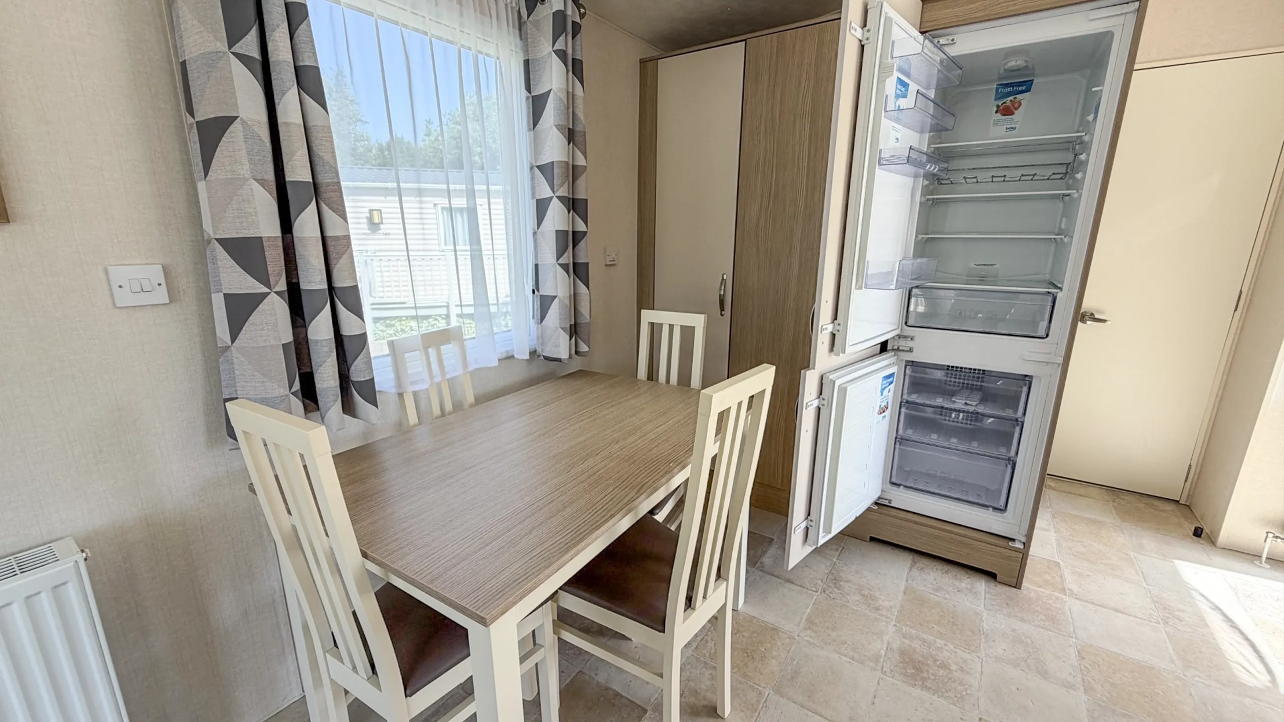 dining room in open plan kitchen in a 2018 victory echo for sale at Coastfields