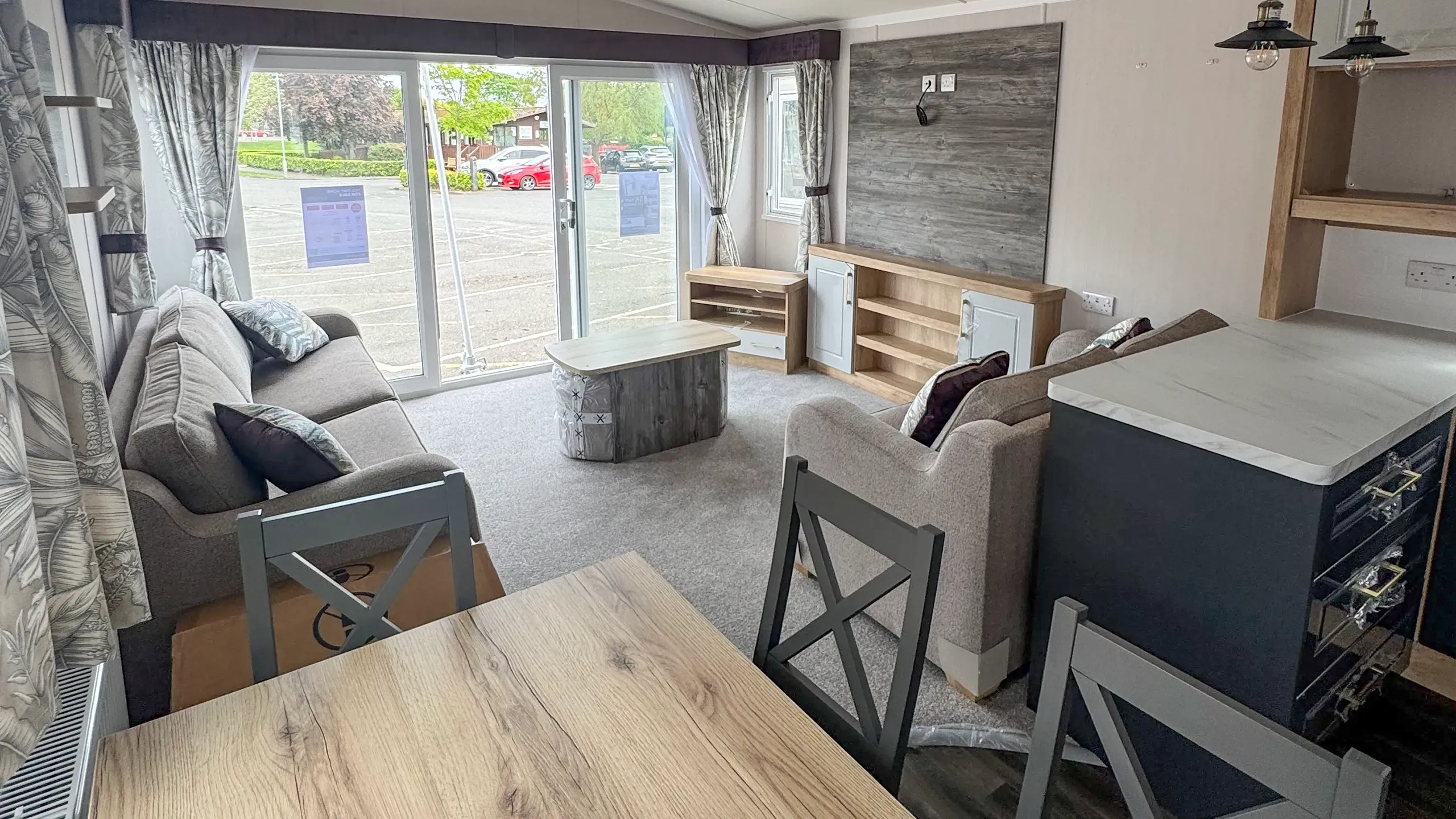 2026 Swift Bordeaux holiday home at Coastfields in Skegness showing a living room and large patio doors