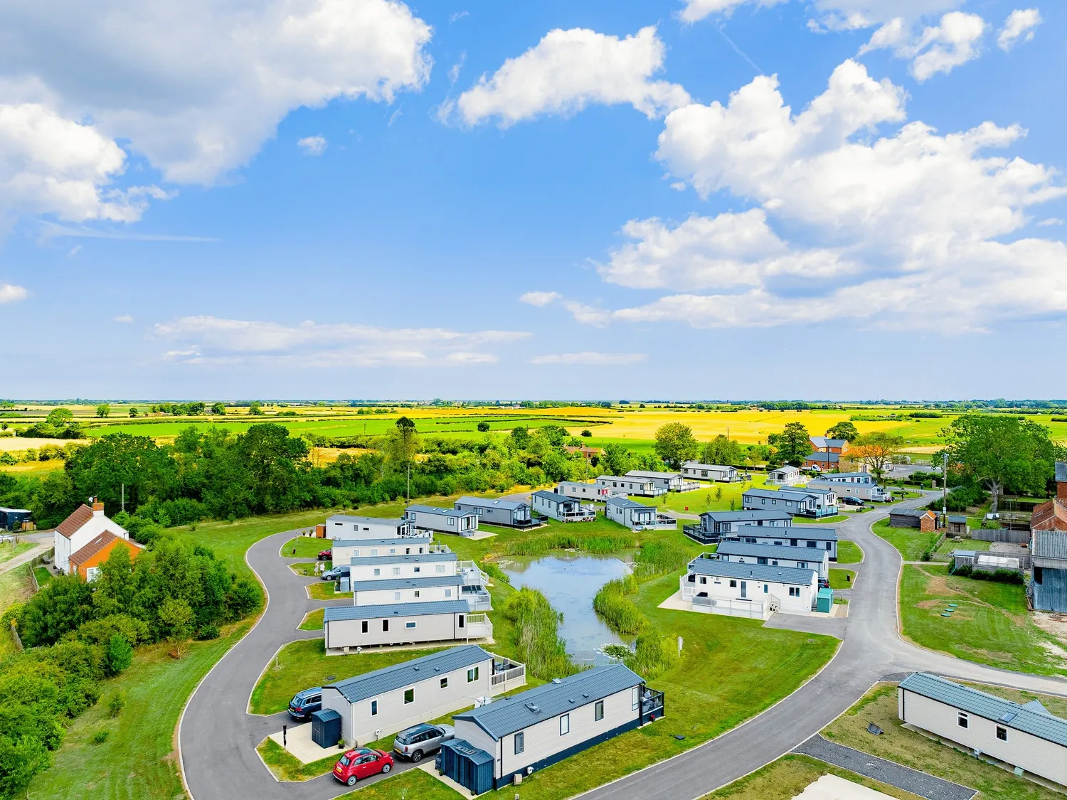 Helsey Farm Aerial Shot Pond Caravans