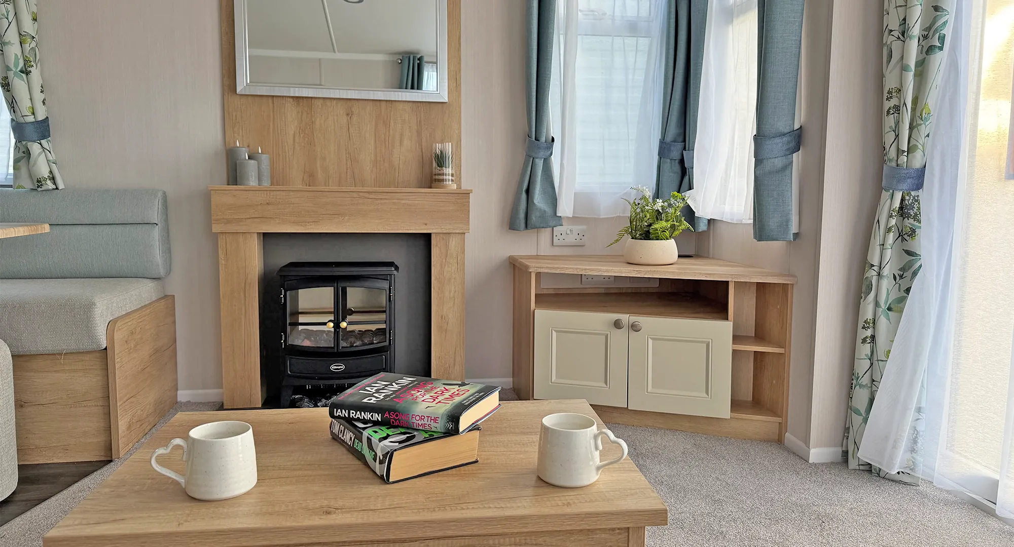 Swift Burgundy for sale at coastfields living room with tv stand, coffee table and fireplace