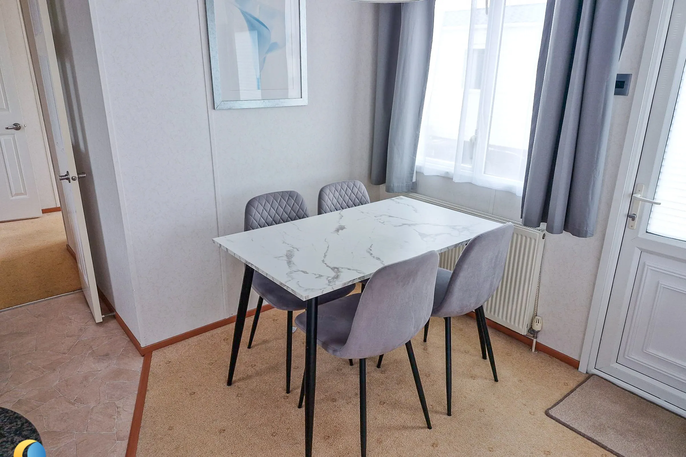 Coastfields 2007 Carnaby Dovedale separate dining area with table and chairs