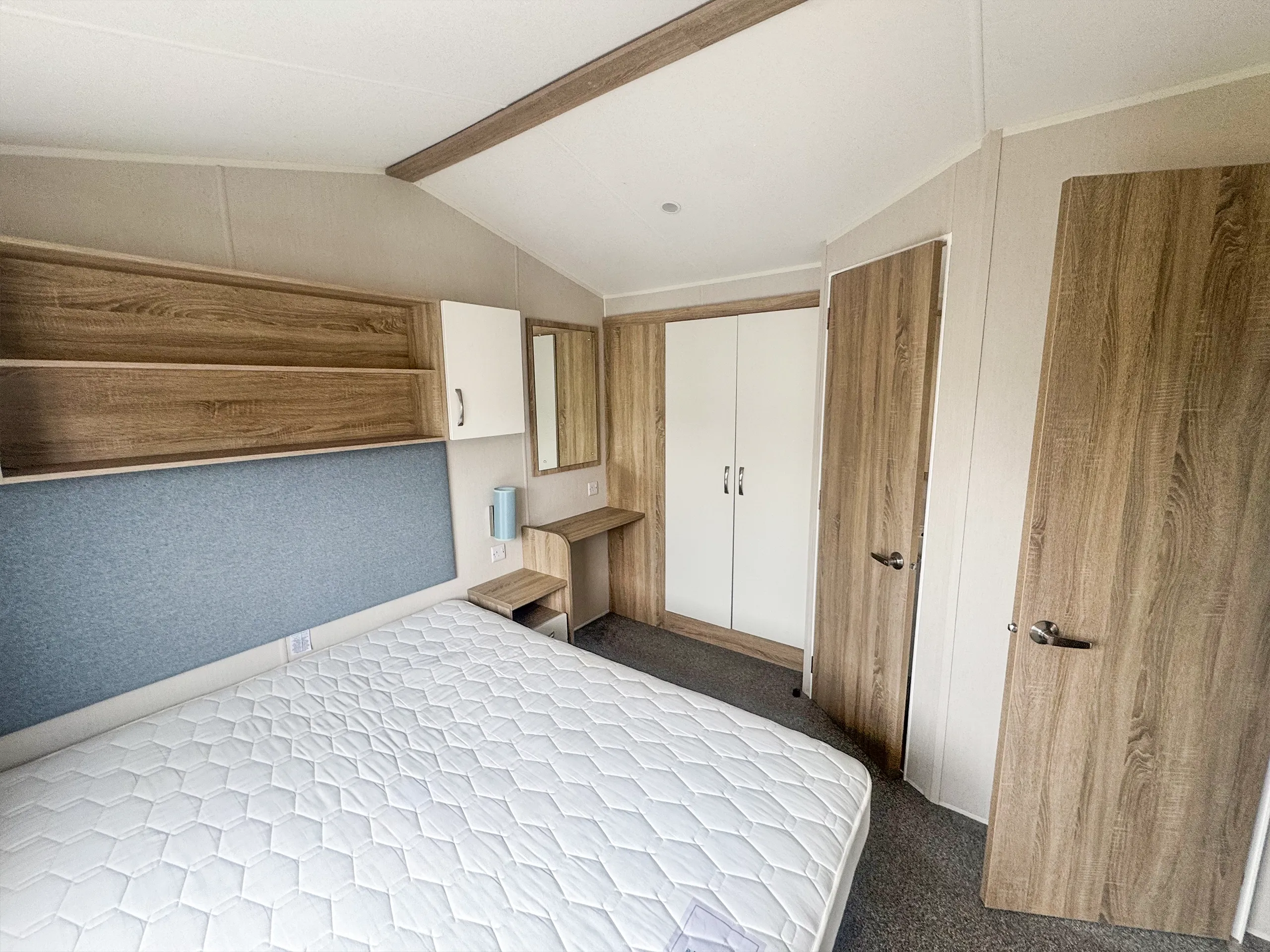 Master bedroom with built in storage in the 2020 Willerby Sienna holiday home