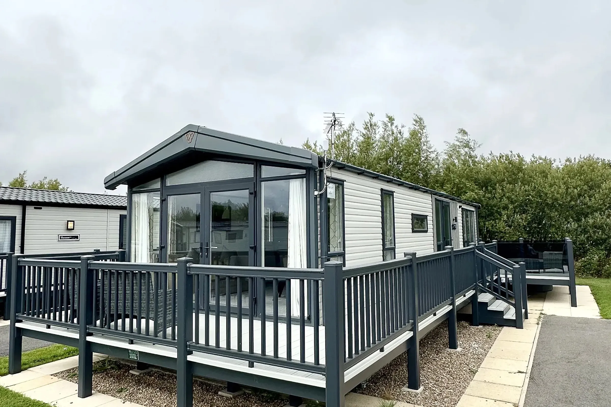 Coastfields 2023 Victory Lakewood Lodge exterior with decking