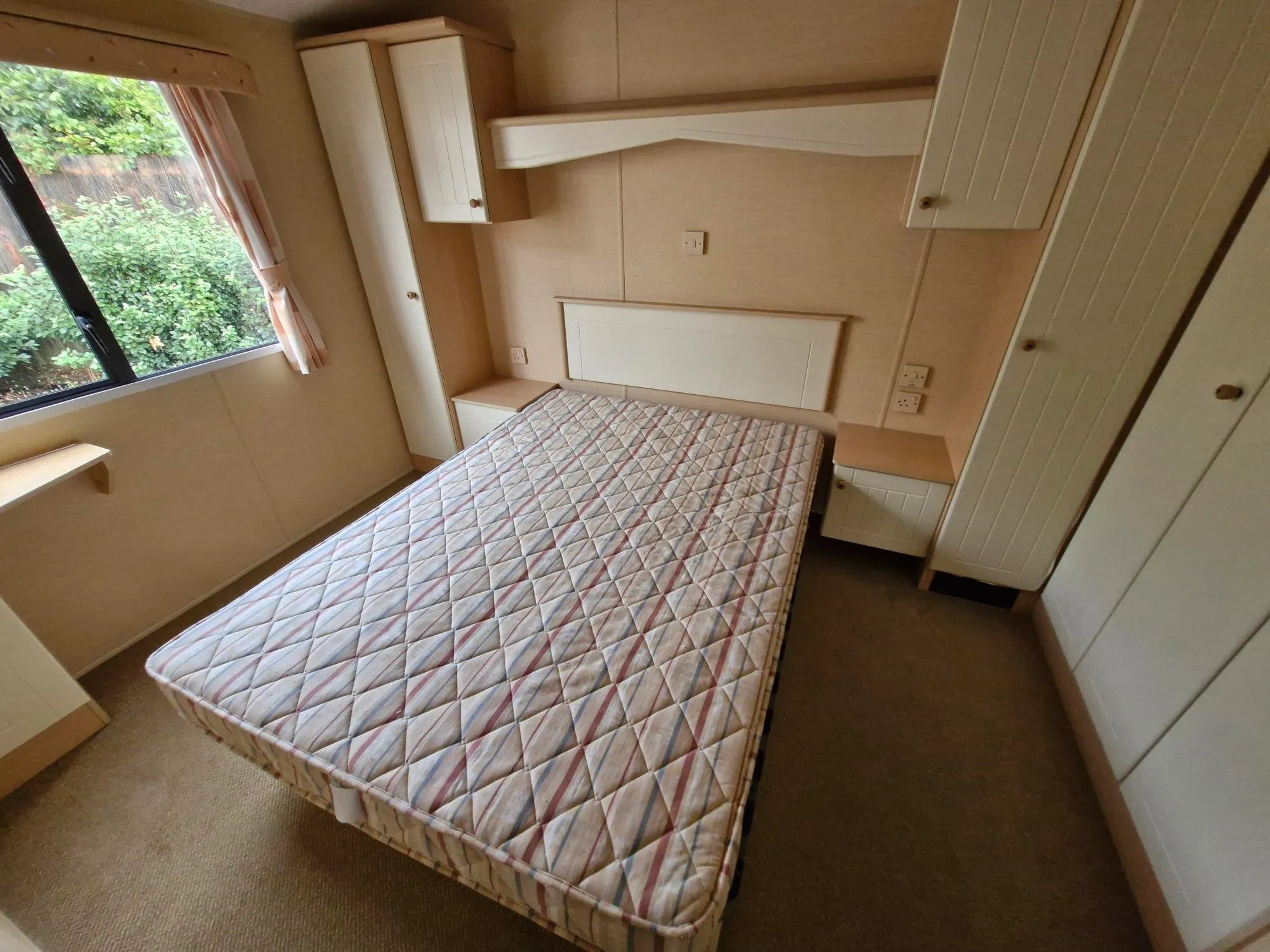 Willerby Savoy master bedroom with built in storage