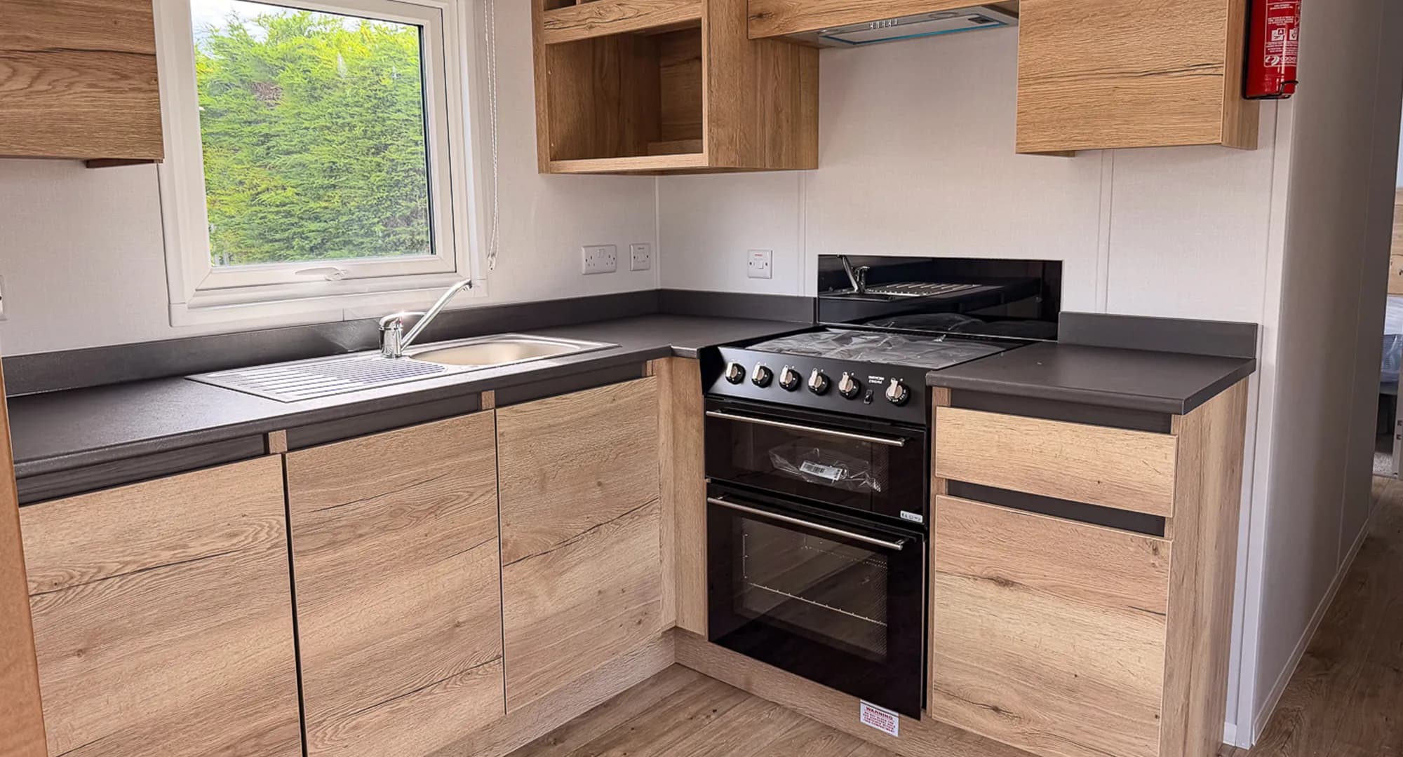 Modern kitchen with stove and double oven