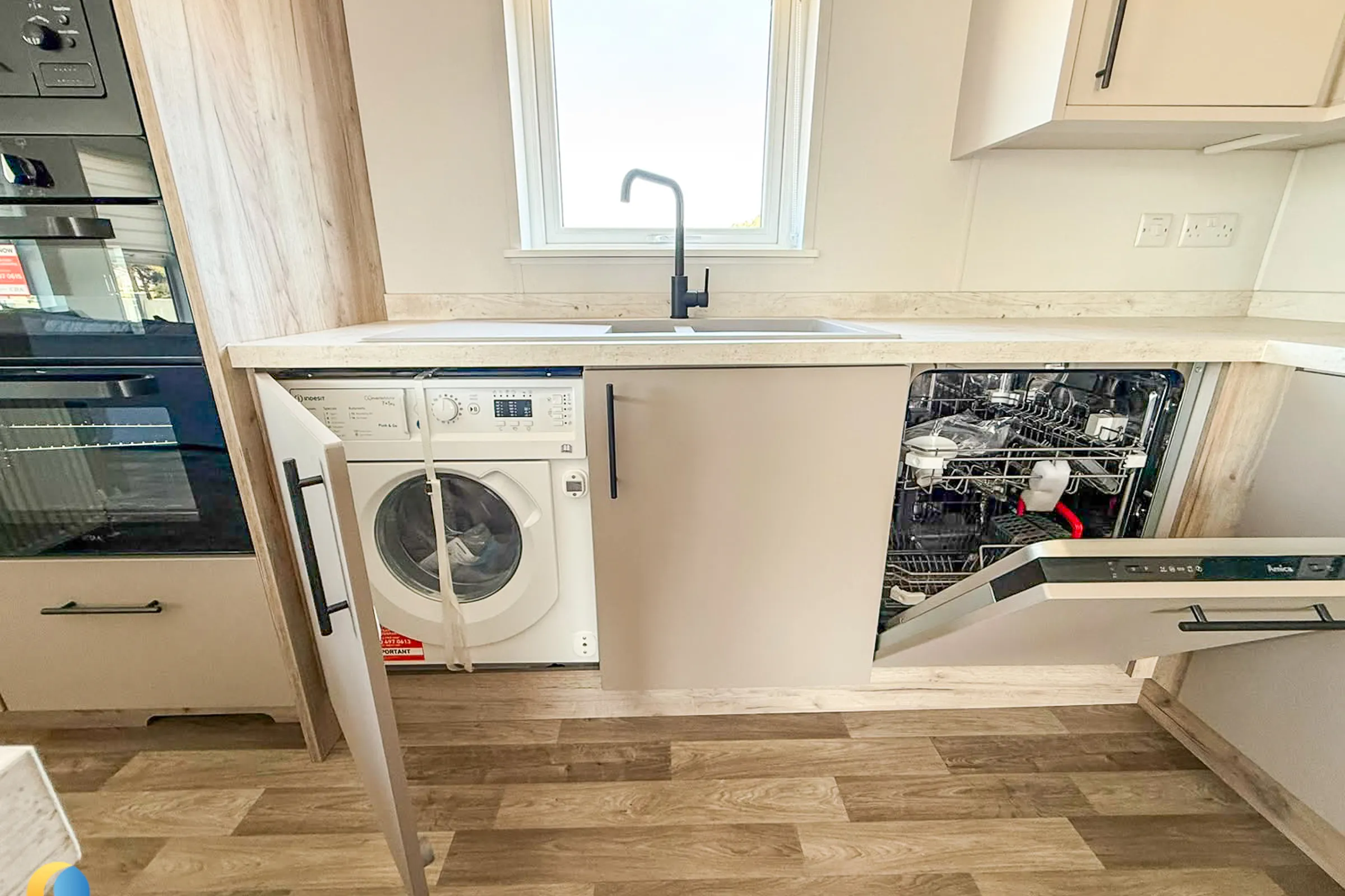 2026 Willerby Mapleton Kitchen Front View of Dishwasher and Washing Machine