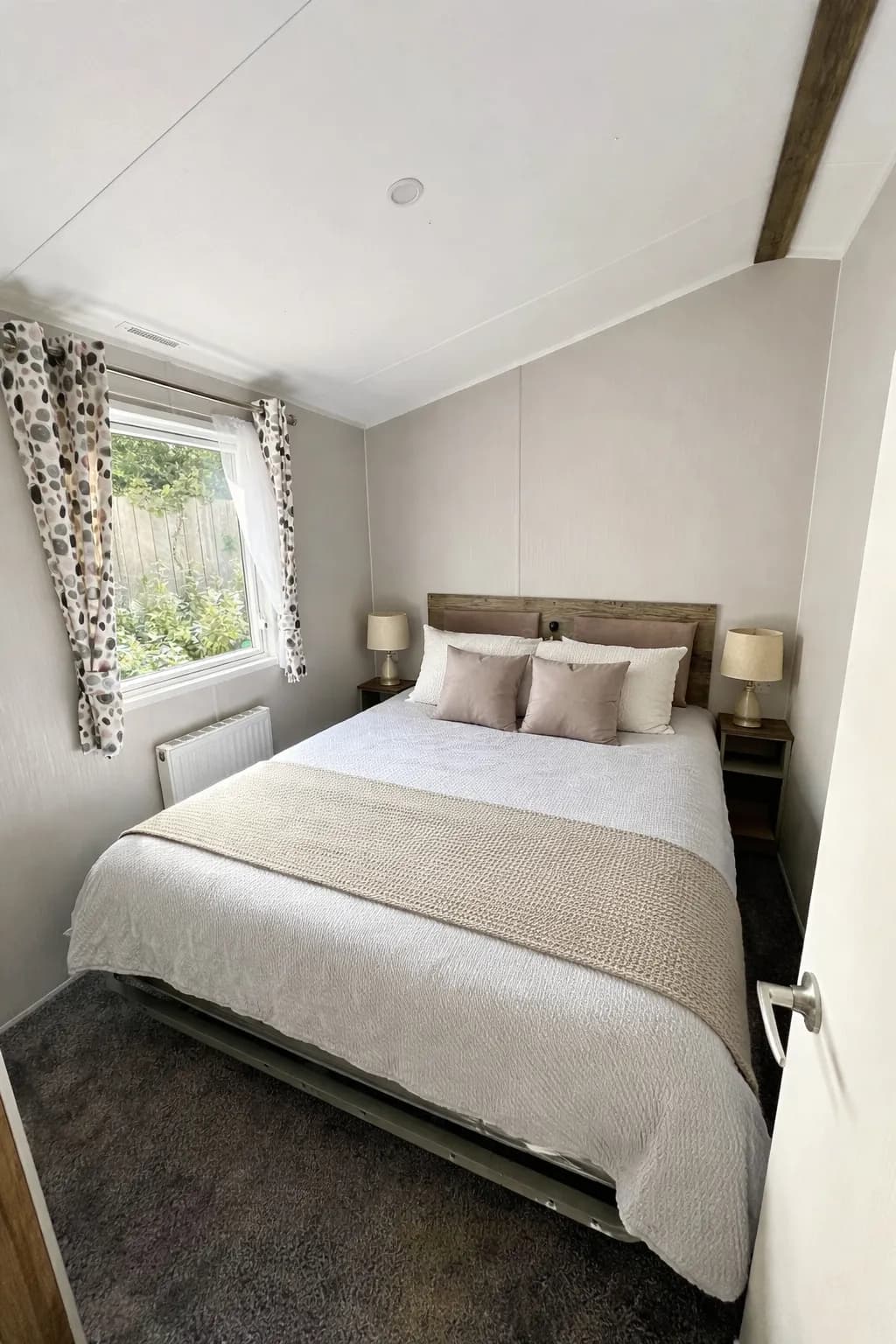 Master bedroom with double bed and fitted wardrobe in the 2025 Willerby Malton