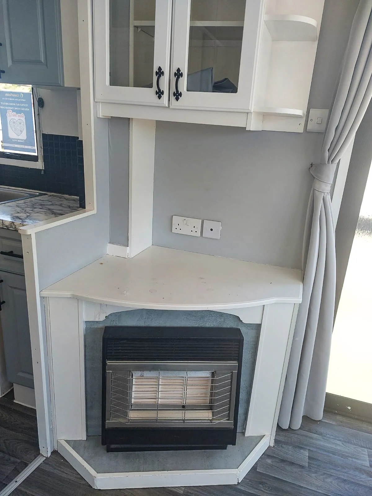 fireplace and overhead cabinets