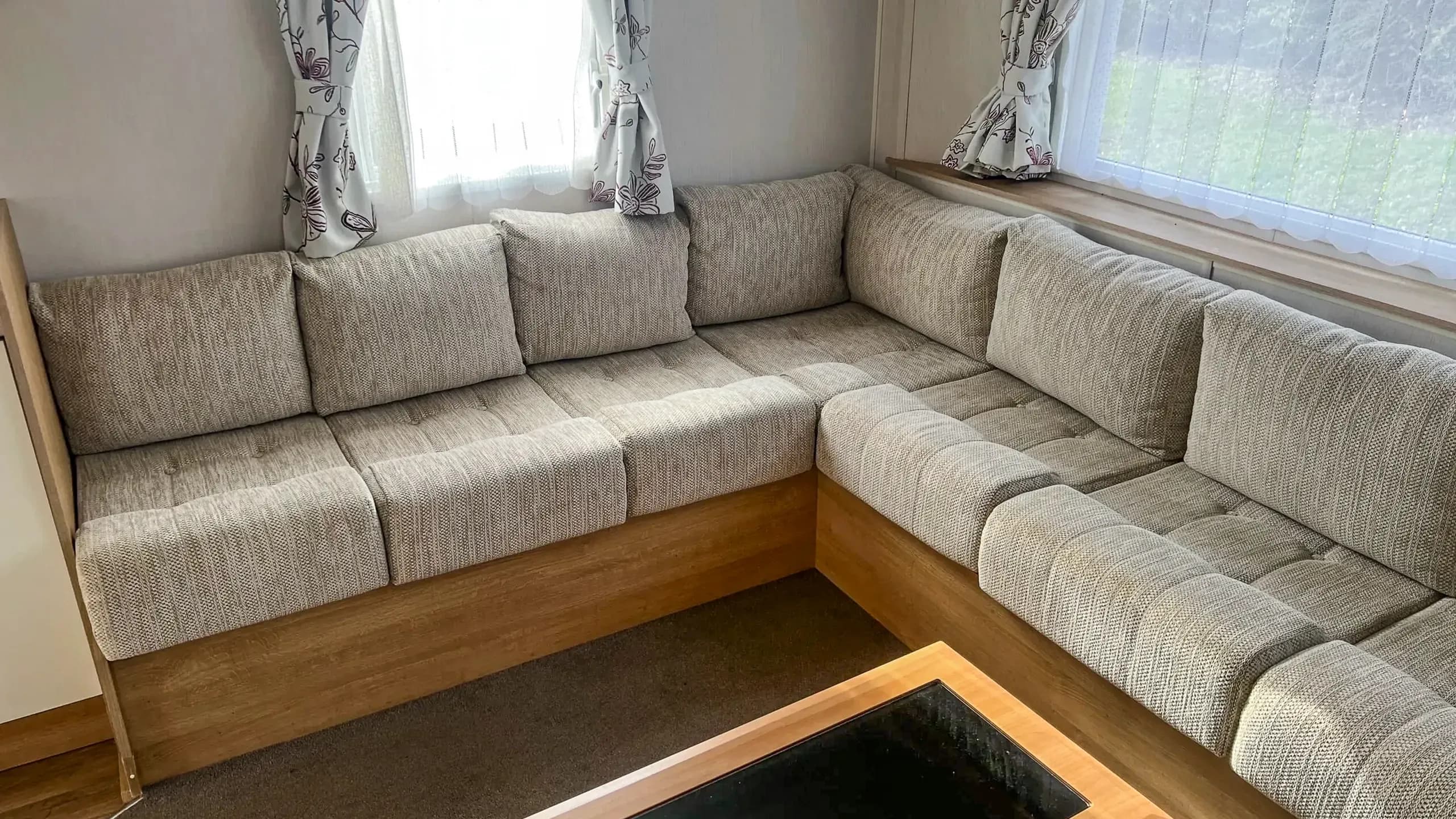 Living room seating area on 2015 Willerby Vacation caravan for sale at Coastfields