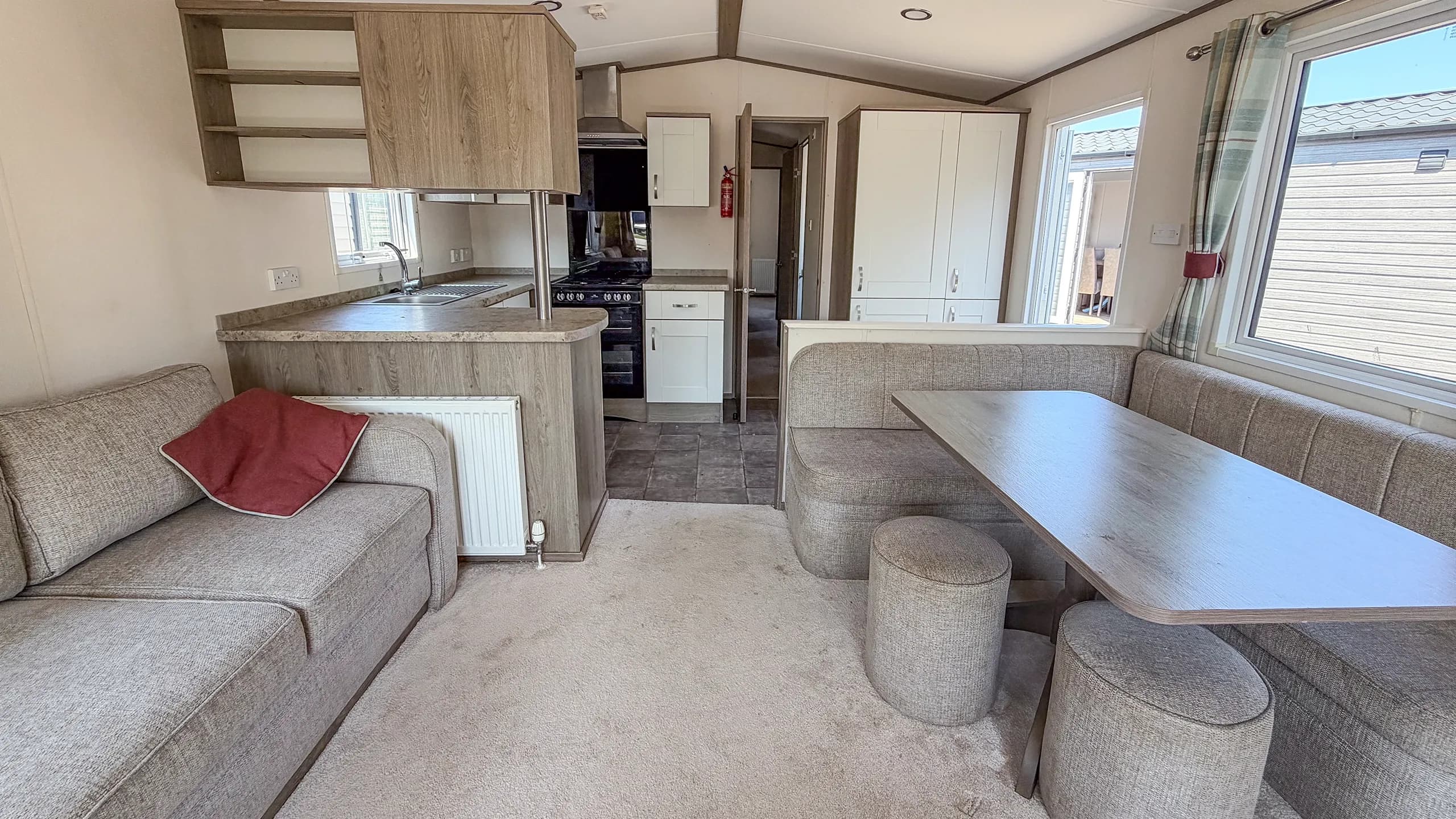 living area through to the kitchen, open plan