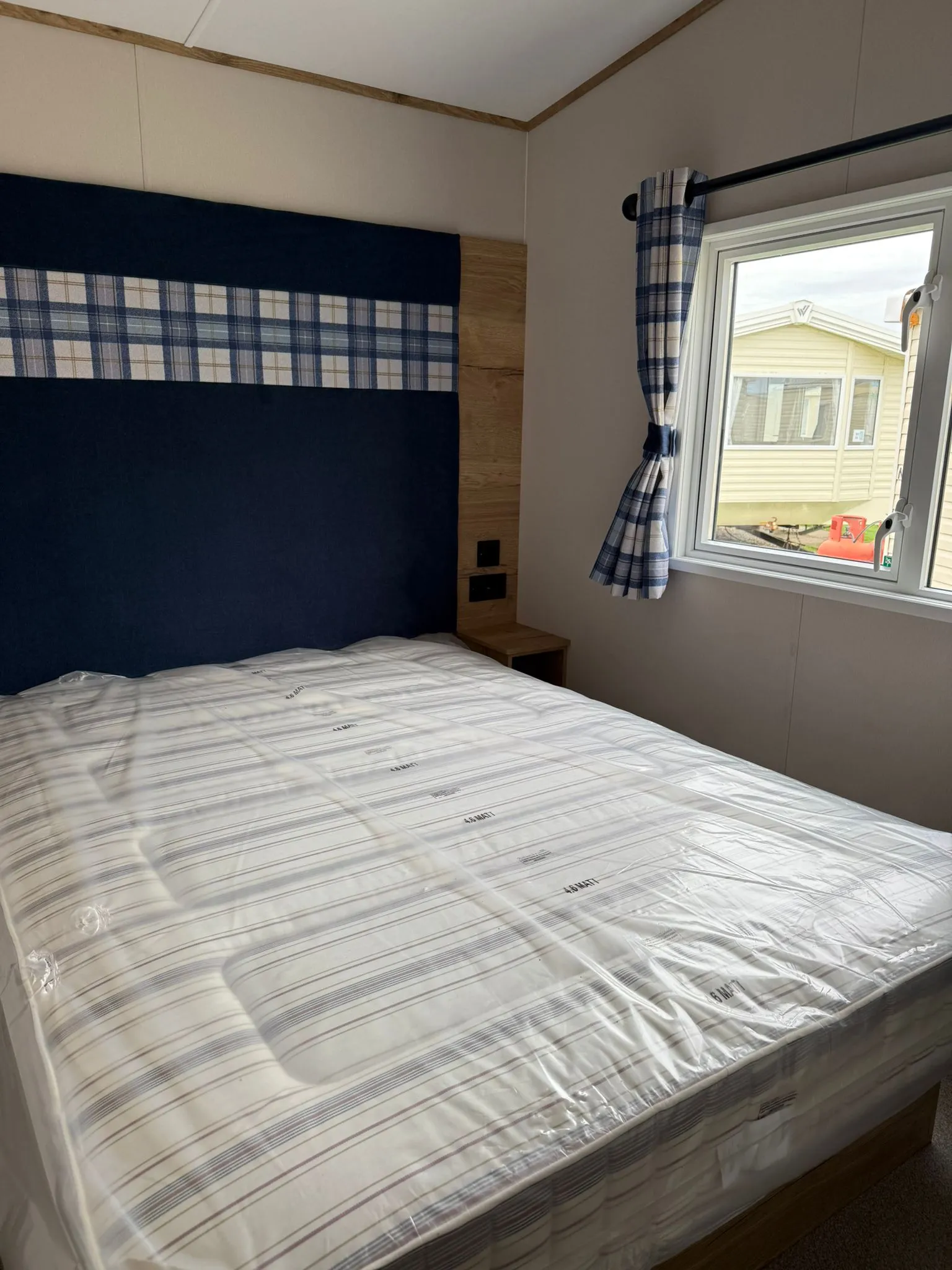 Master bedroom with fitted wardrobes in the 2026 ABI Louis