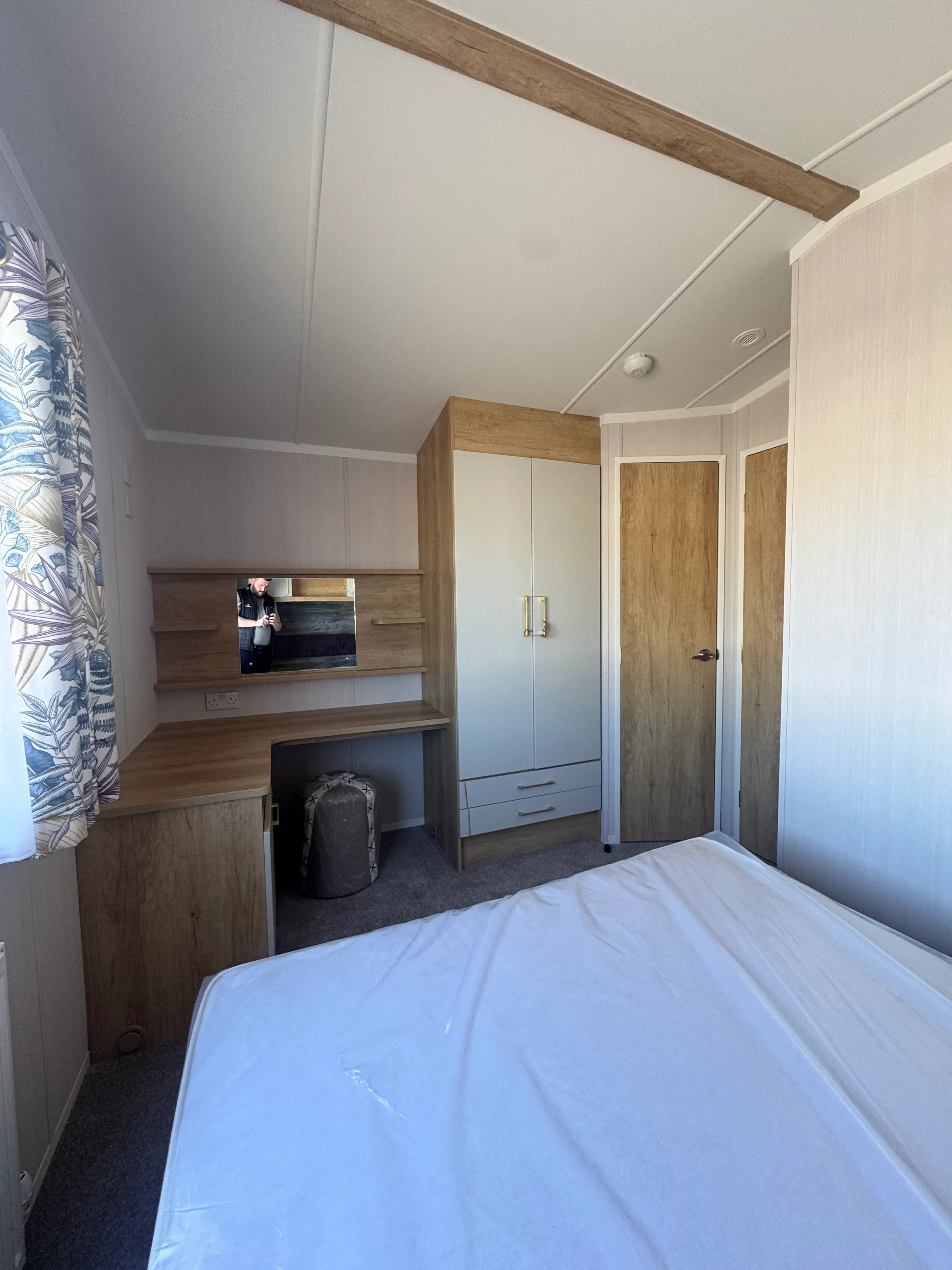 Built in Storage in Master bedroom with lift-up storage bed in the 2026 Swift Bordeaux