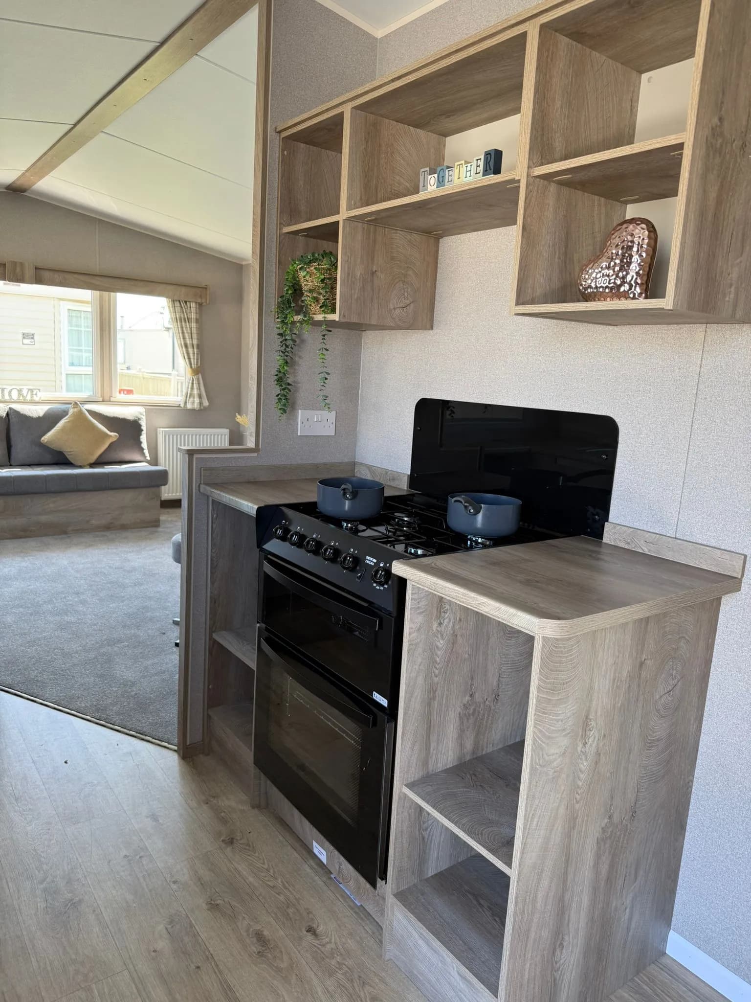 Contemporary kitchen with cooker in the 2026 ABI Seaspray caravan