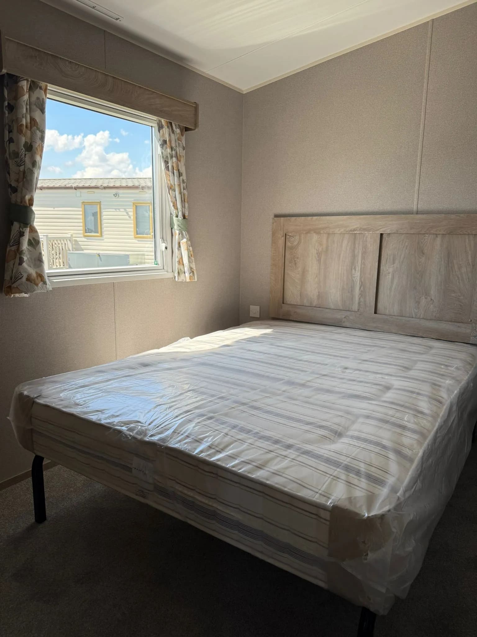 Master bedroom inside the 2026 ABI Seaspray 3 Bed