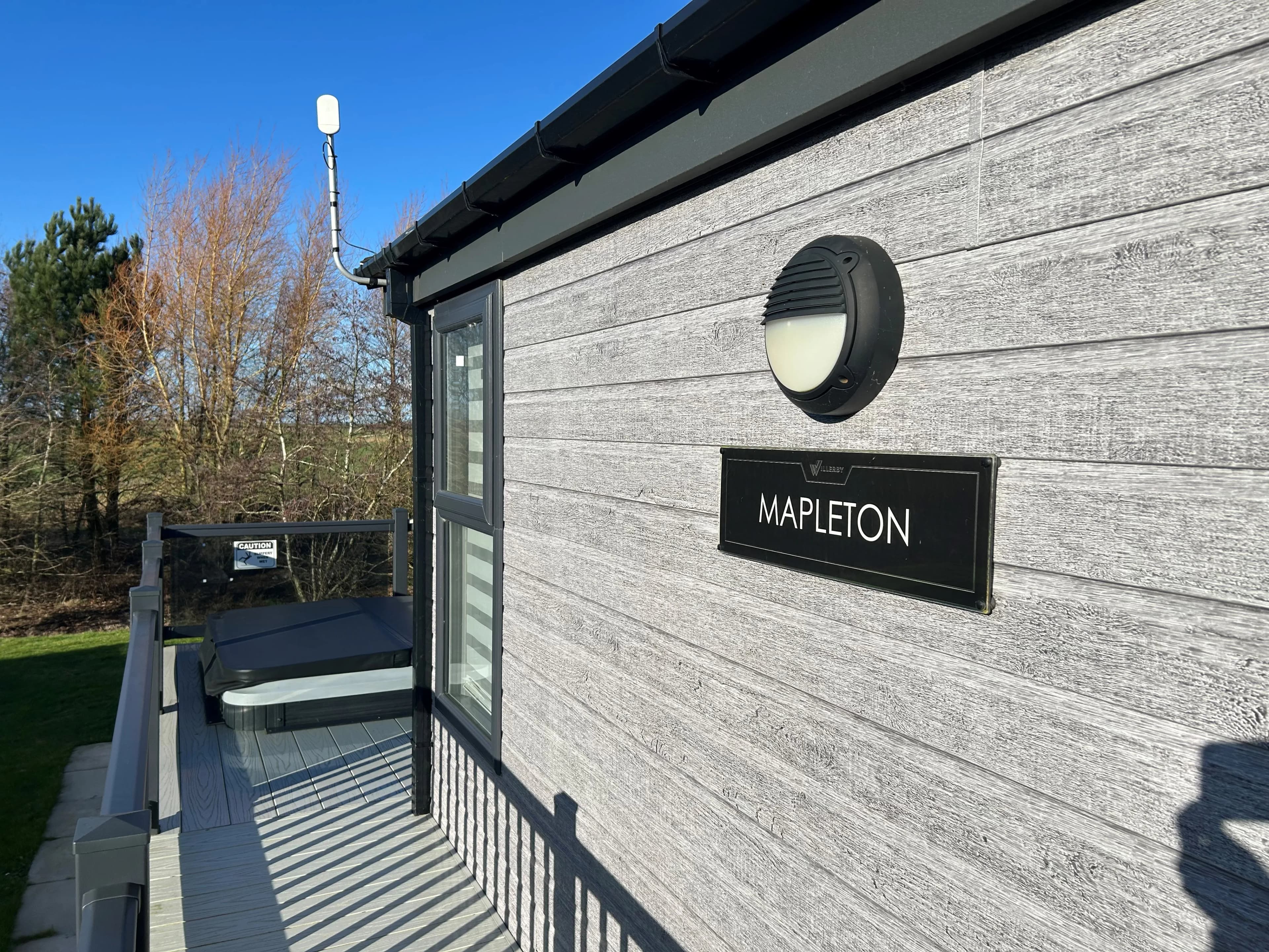 Private hot tub on the decking of the 2021 Willerby Mapleton lodge
