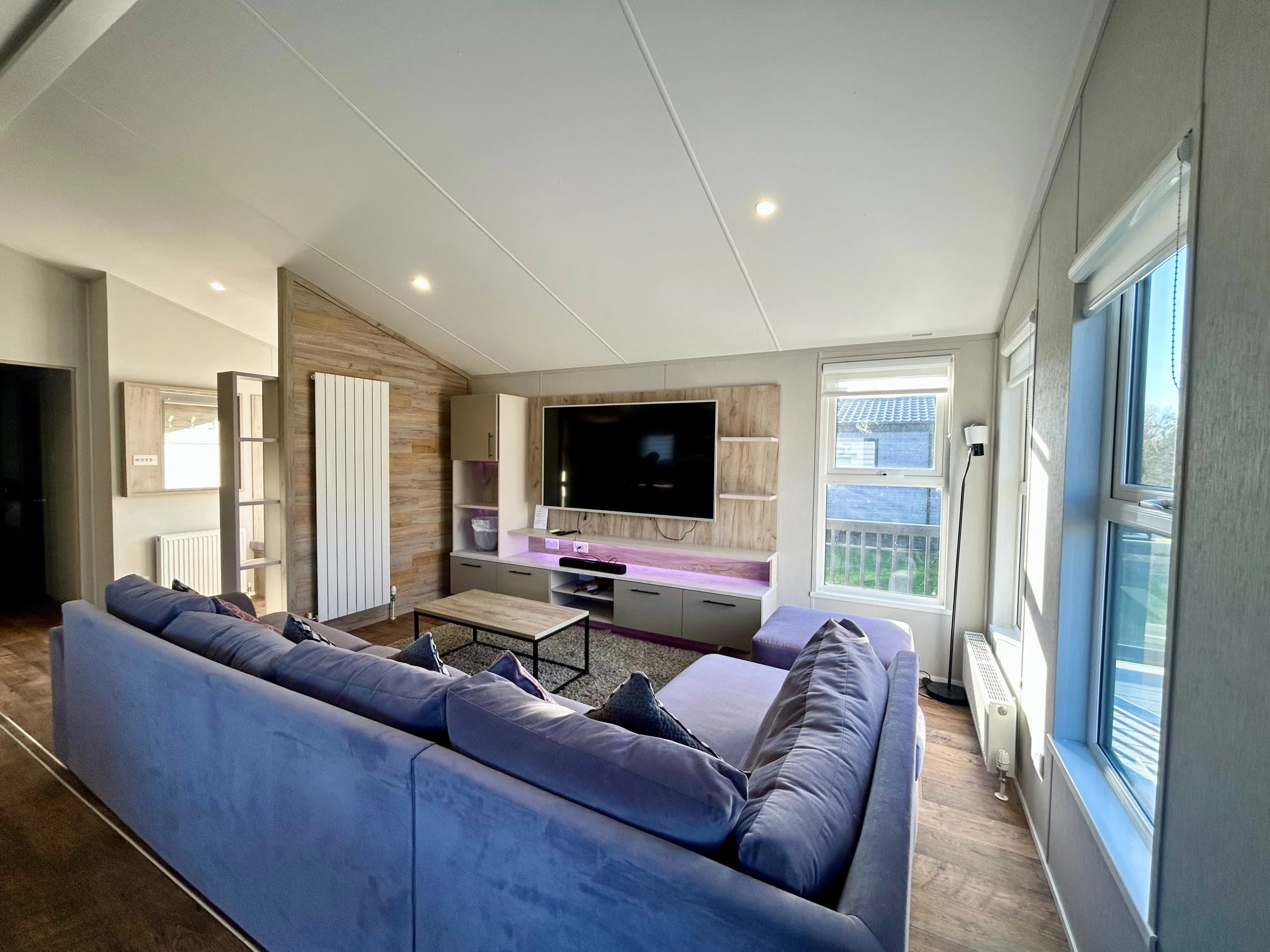 Luxury lounge with media wall in the 2021 Willerby Mapleton lodge