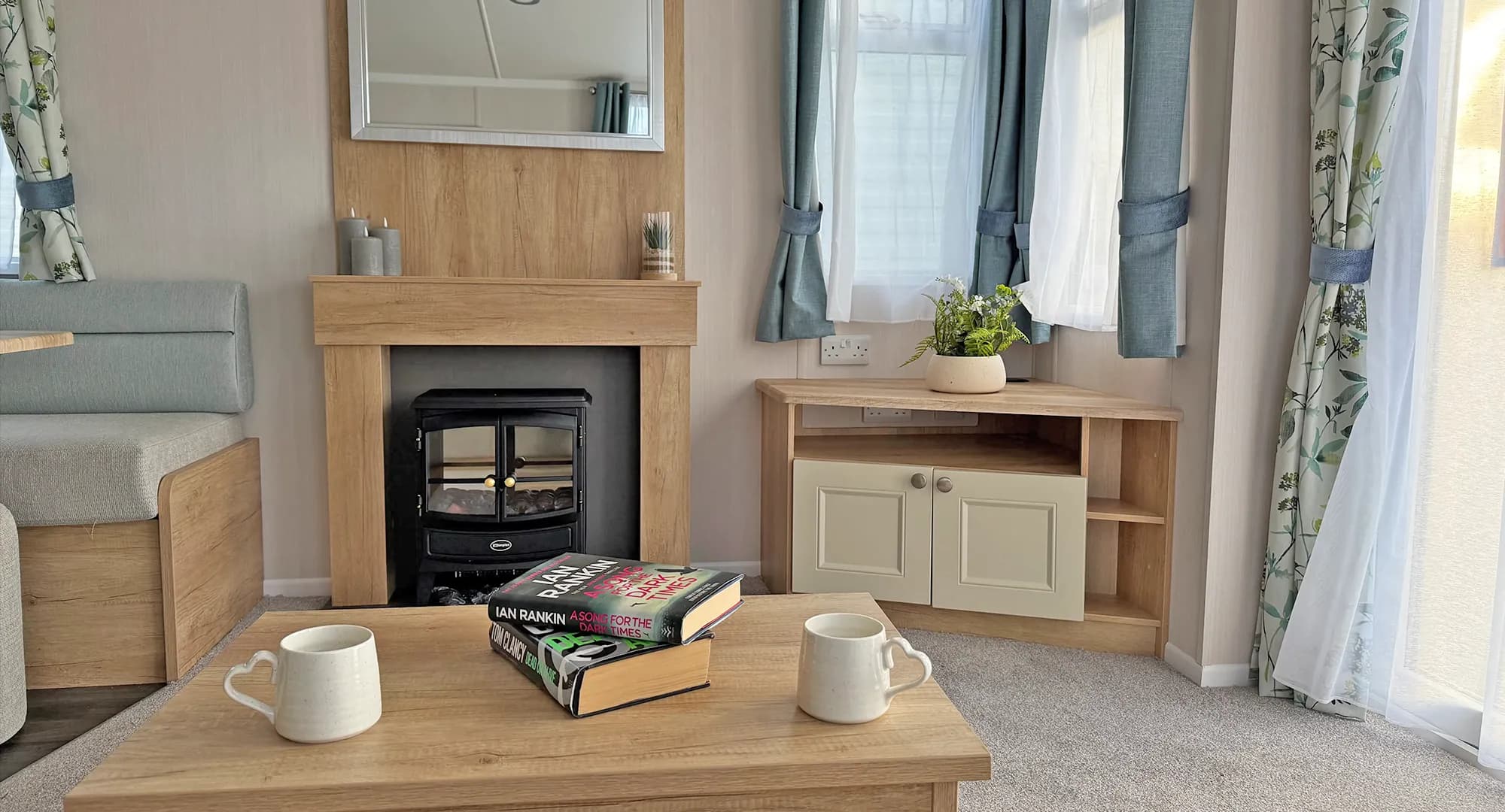 Bright open-plan lounge with patio doors in the 2024 Swift Burgundy
