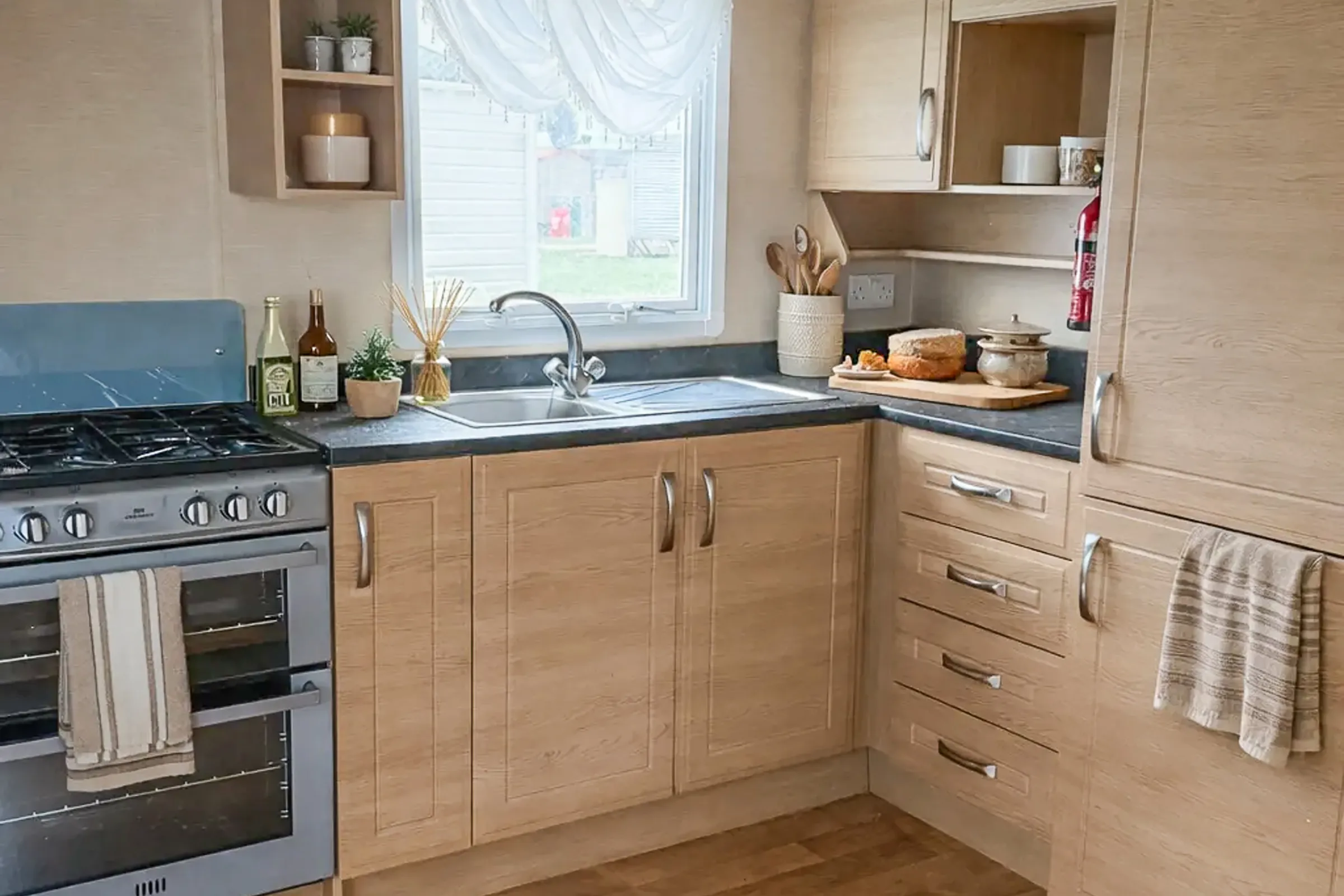 Coastfields 2009 Willerby Granada fitted kitchen with storage and worktop space
