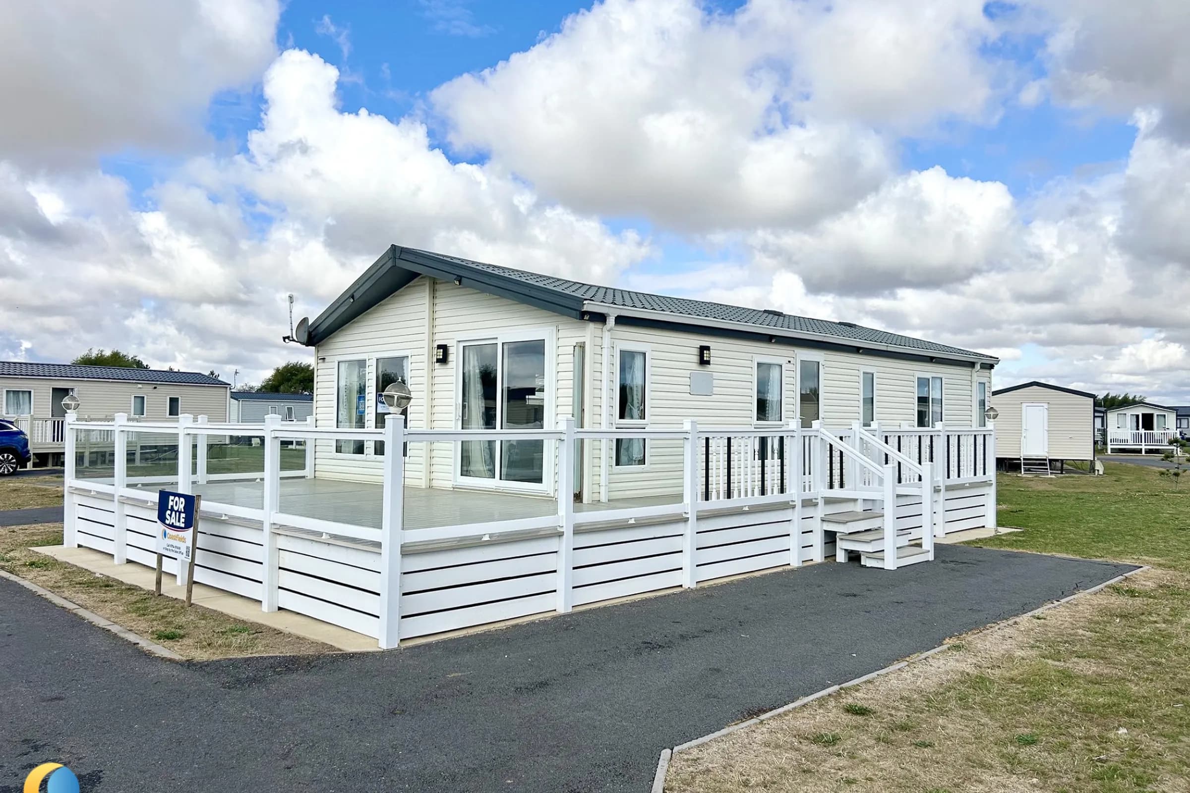 Coastfields 2010 Willerby Boston 40 x 20 exterior with decking at The Grange Leisure Park near Mablethorpe