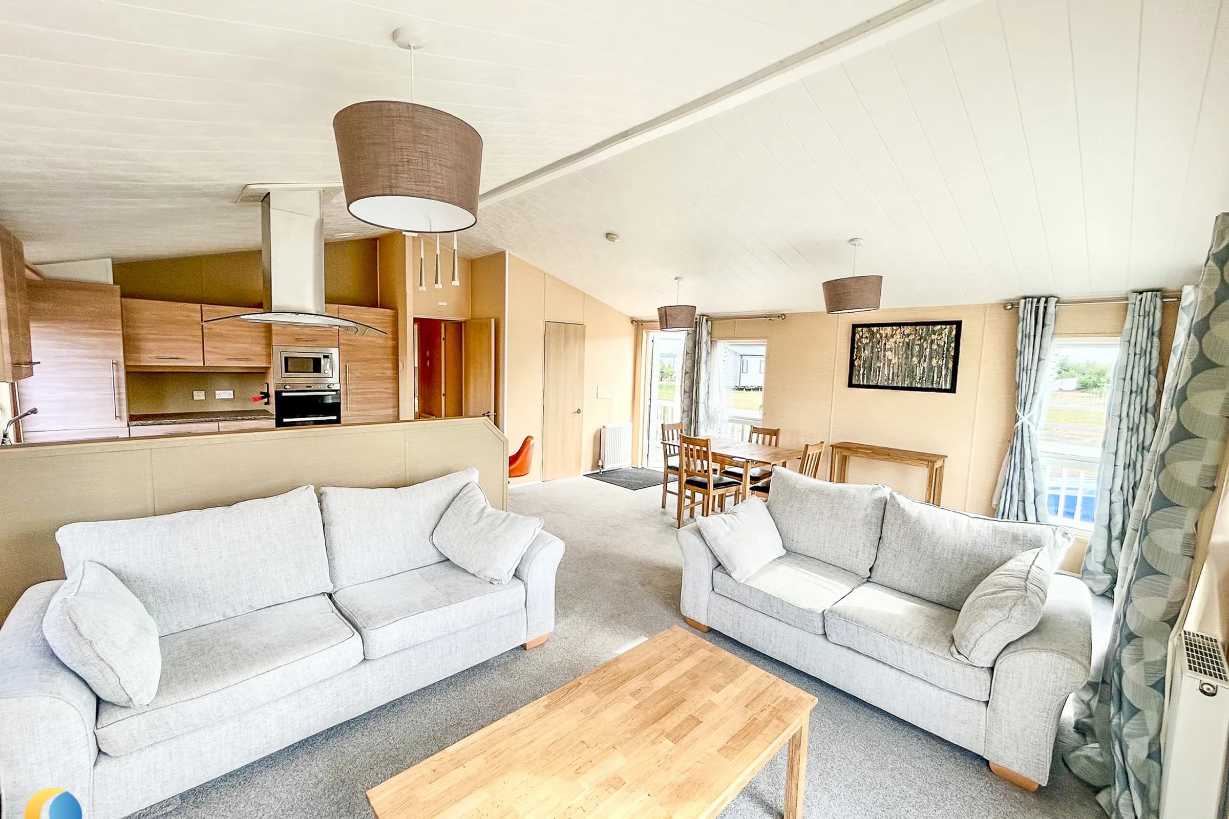 Coastfields 2010 Willerby Boston spacious lounge with freestanding furniture