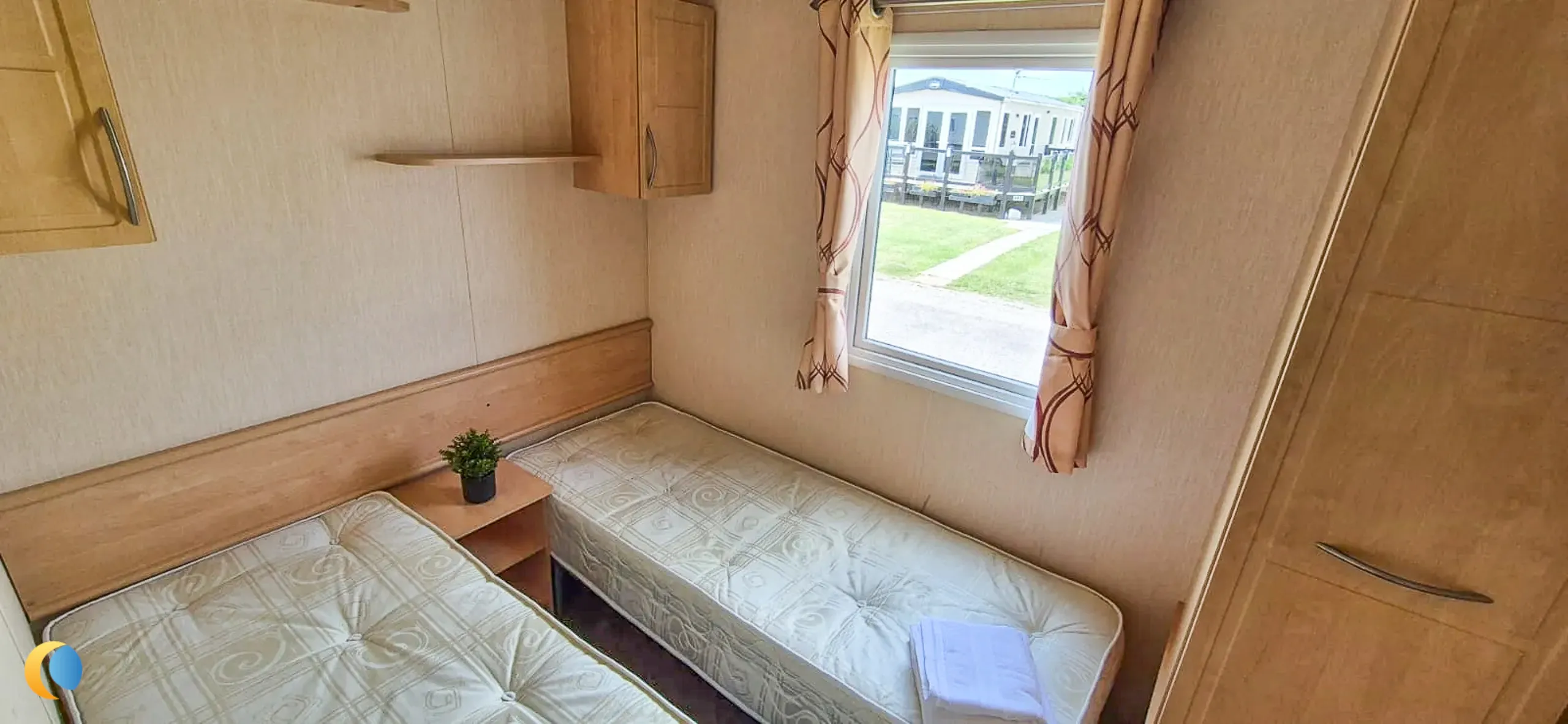 Coastfields 2012 Willerby Rio Gold twin bedroom with storage