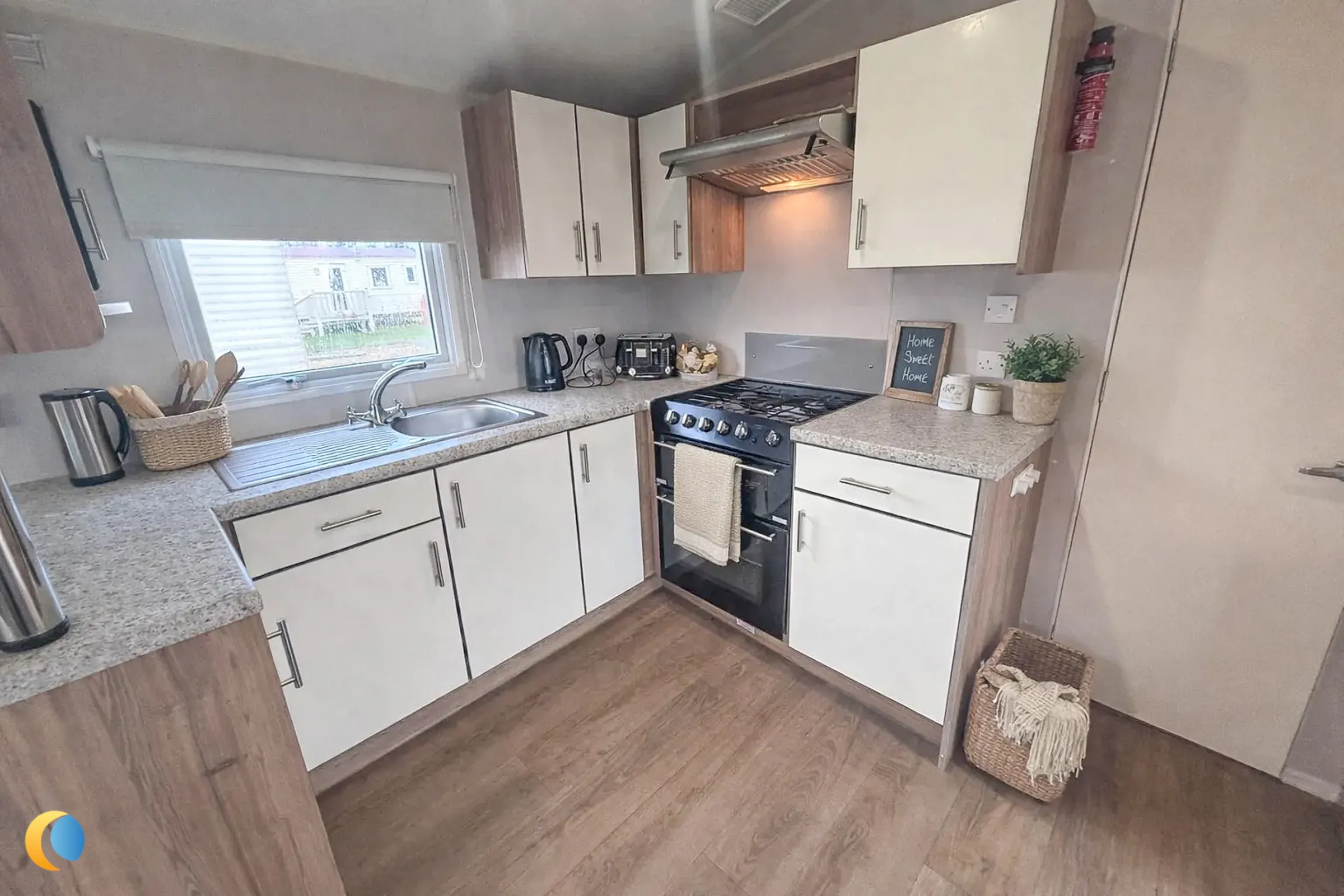 Coastfields 2016 Willerby Vista View fitted kitchen with generous worktop and storage space