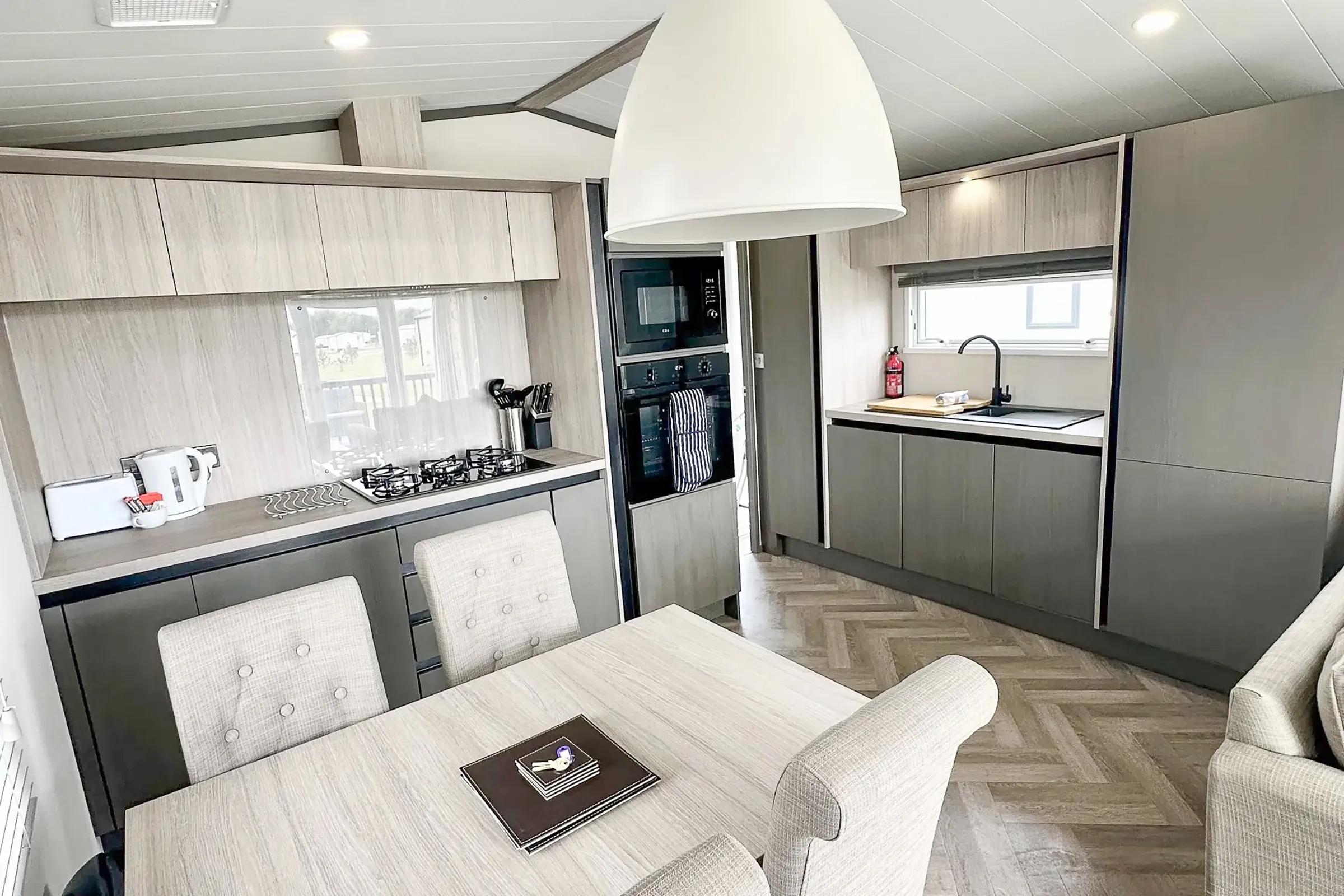 Coastfields 2023 Victory Lakewood Lodge modern kitchen and dining area