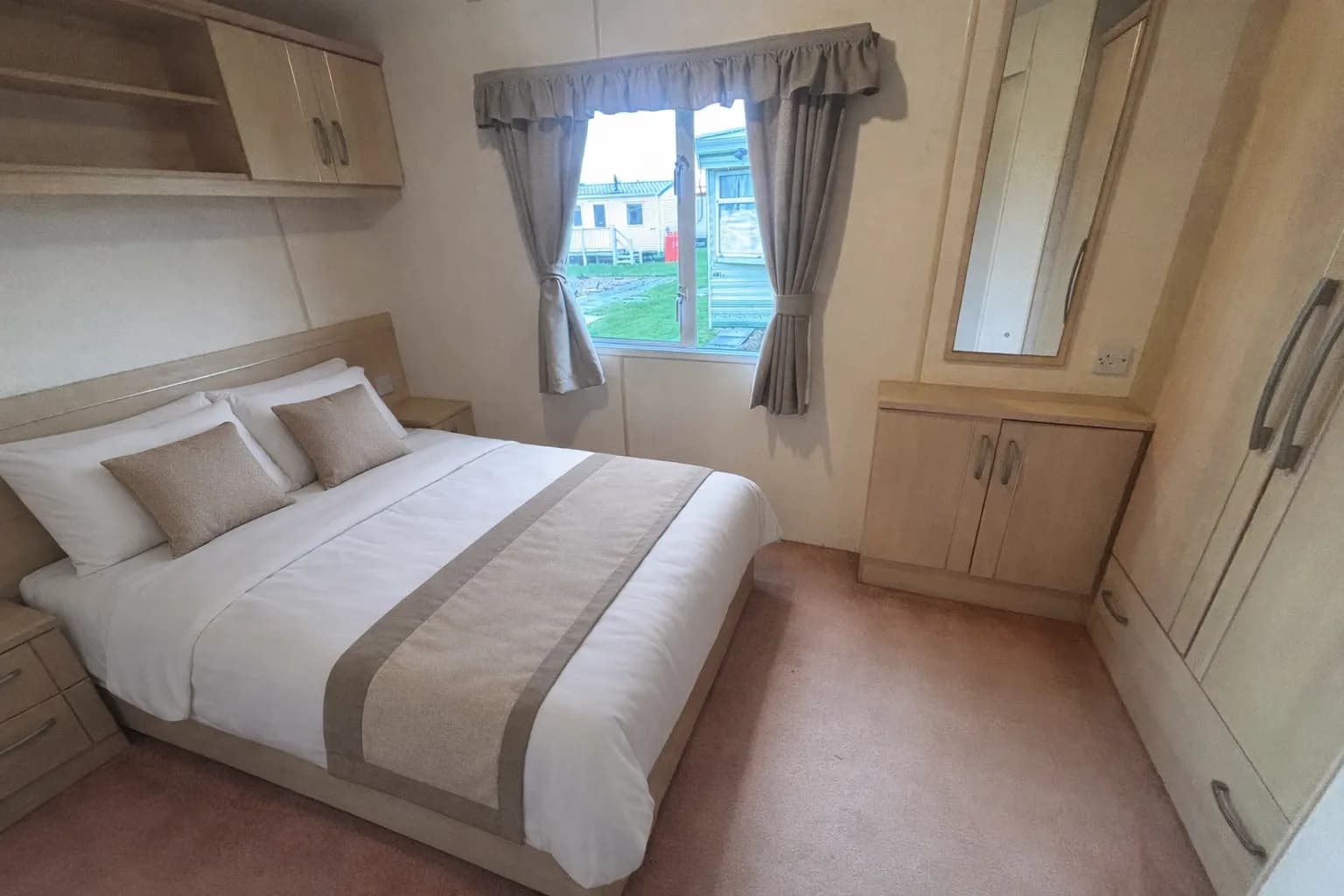 Master bedroom with fitted storage in the 2007 Atlas Nevada Plus