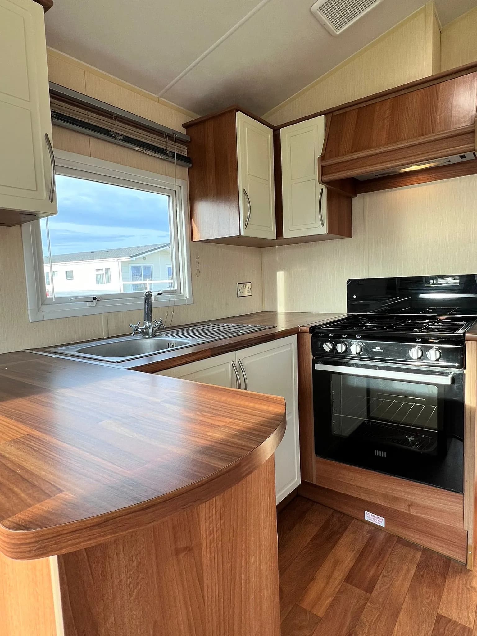 Modern kitchen in the 2012 Willerby Rio Gold with ample storage and worktop space