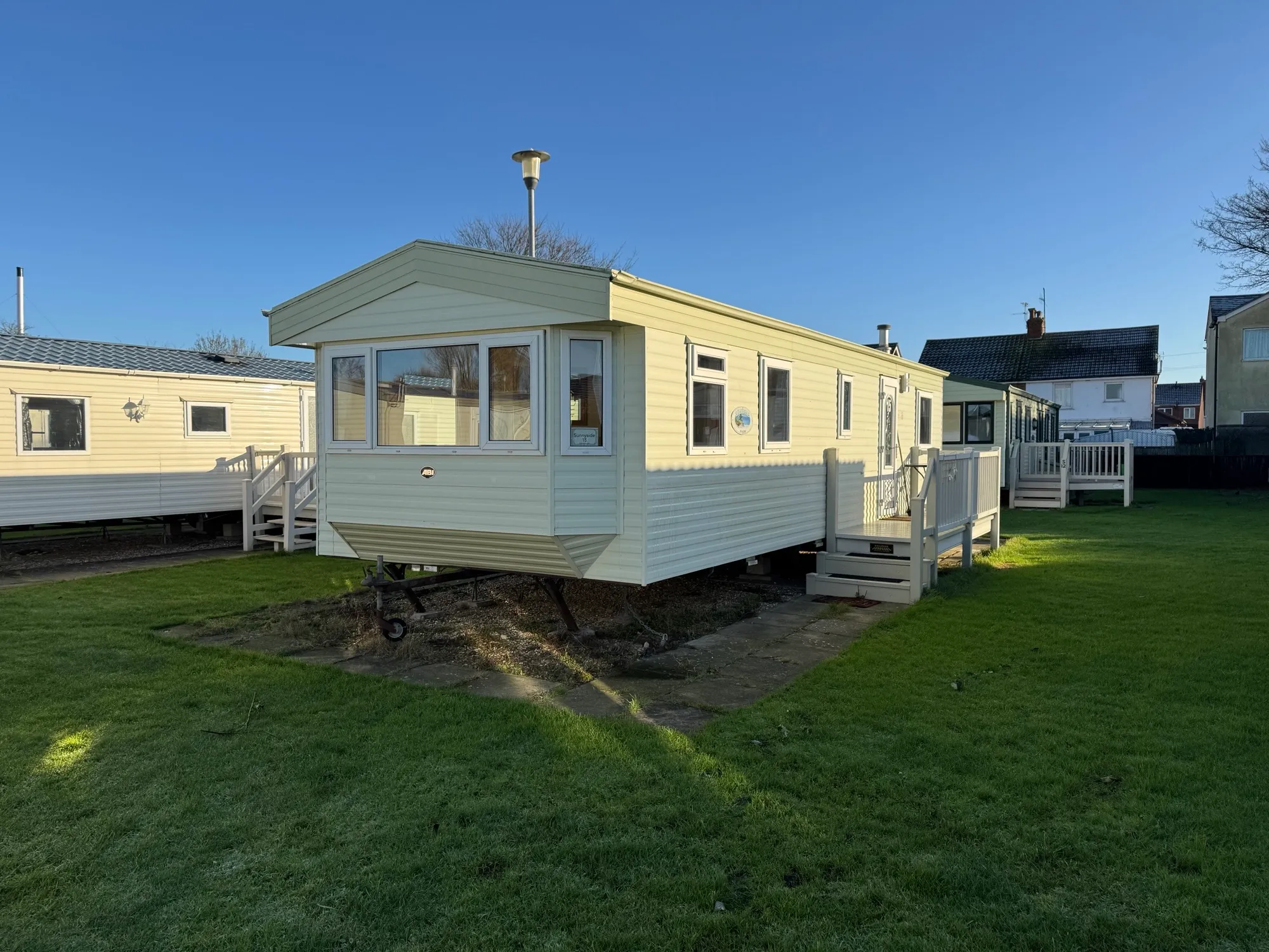 ABI Brisbane 32 x 12 x 2bed 2004 U1454 front of caravan