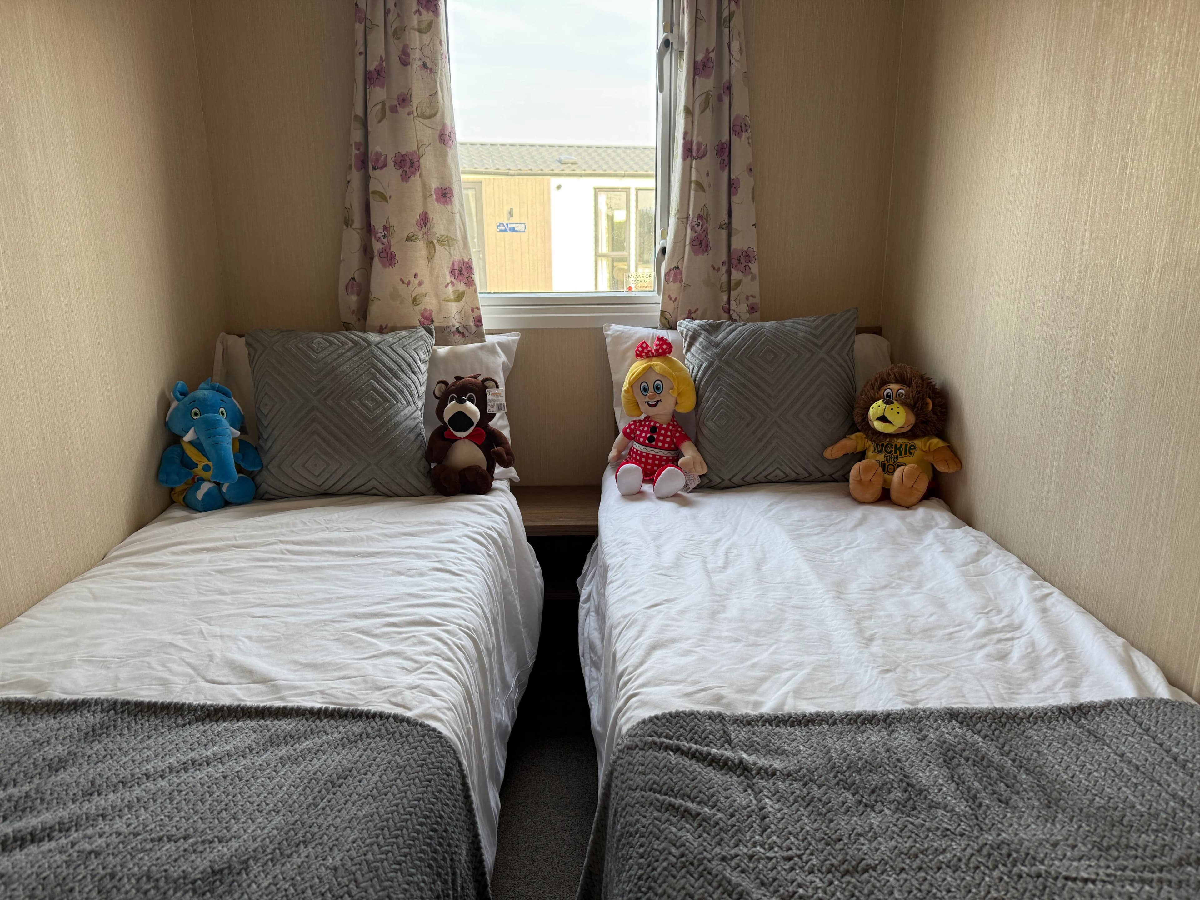 Twin bedroom with two single beds in the 2015 ABI Summerbreeze
