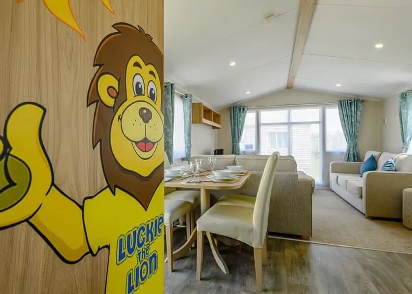 Coastfields Holiday Village-Luckie the Lion caravan-lounge-dining 2