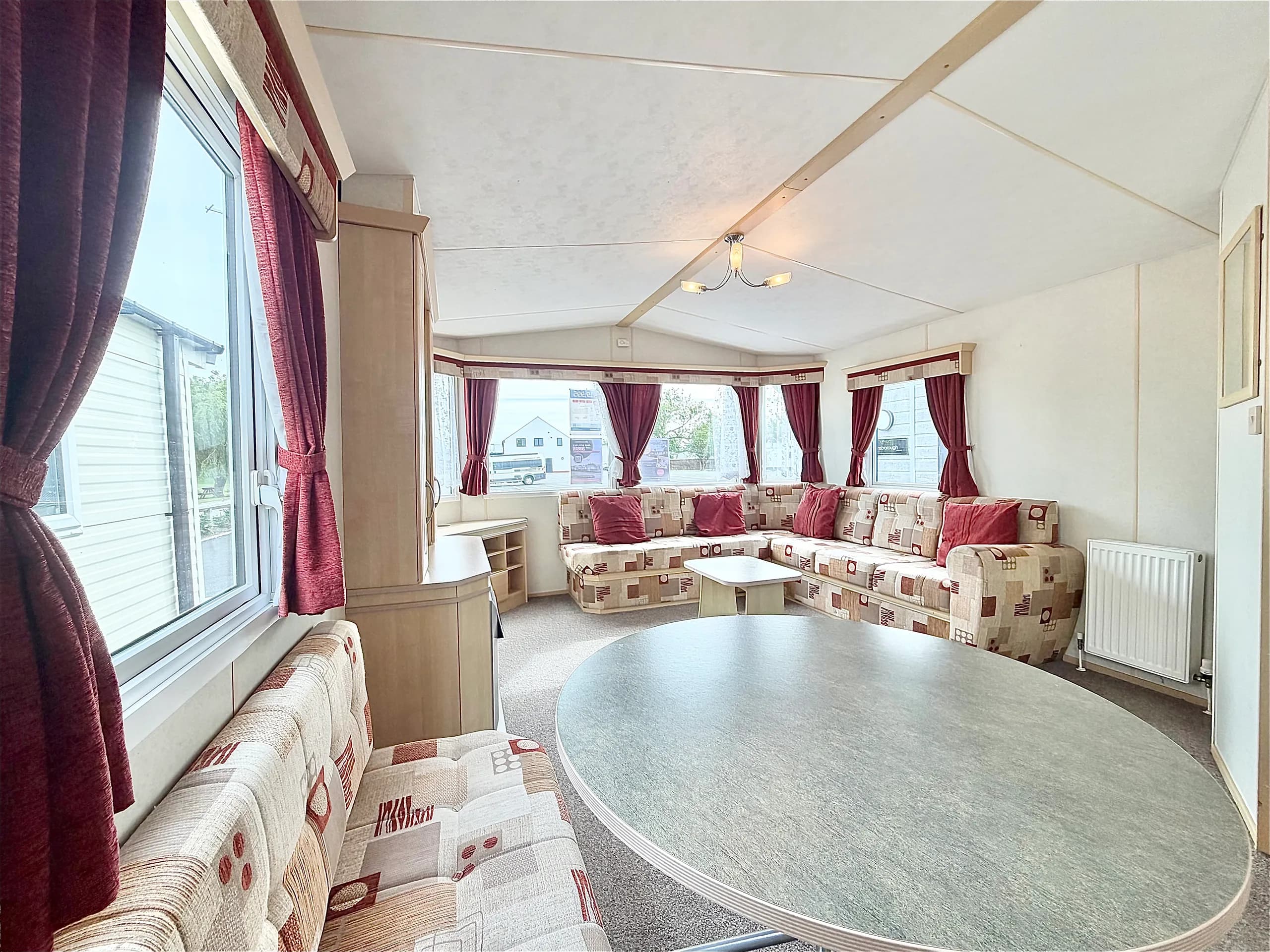 Dining area inside the 2008 ABI Roselle holiday home