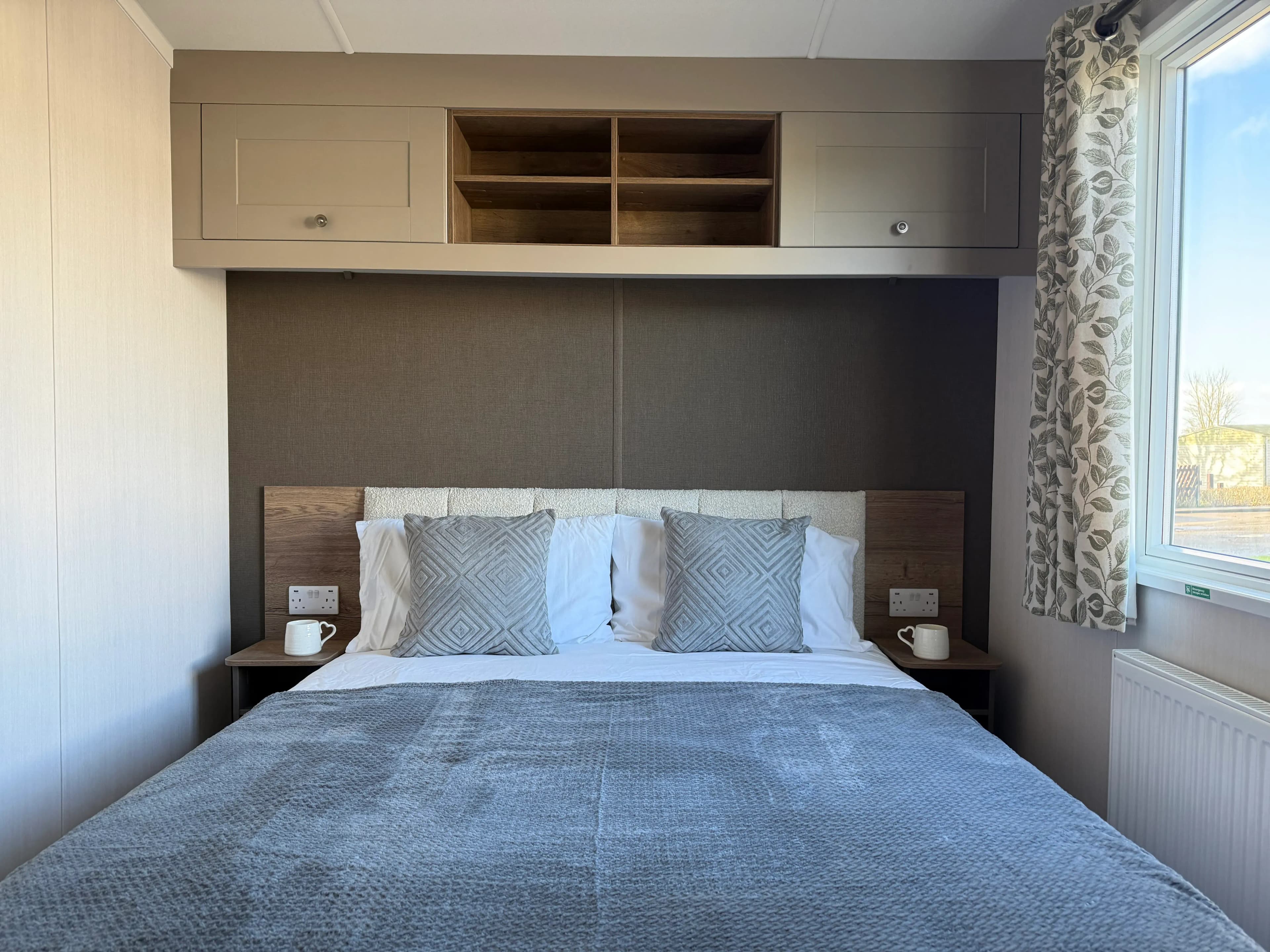 Master bedroom with double bed and fitted wardrobe in the 2026 Swift Morlaix