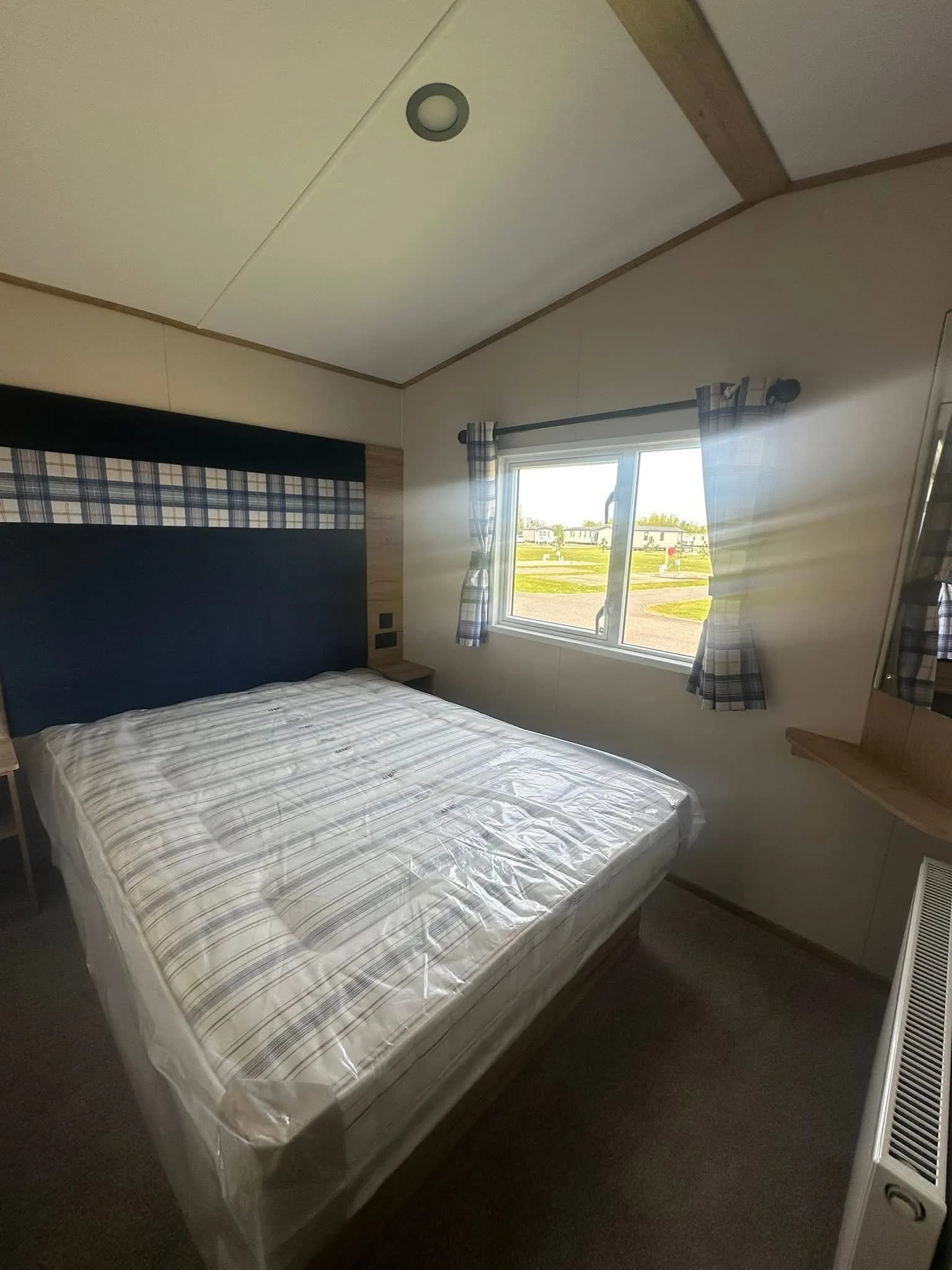 Master bedroom with fitted wardrobes in the 2026 ABI Louis