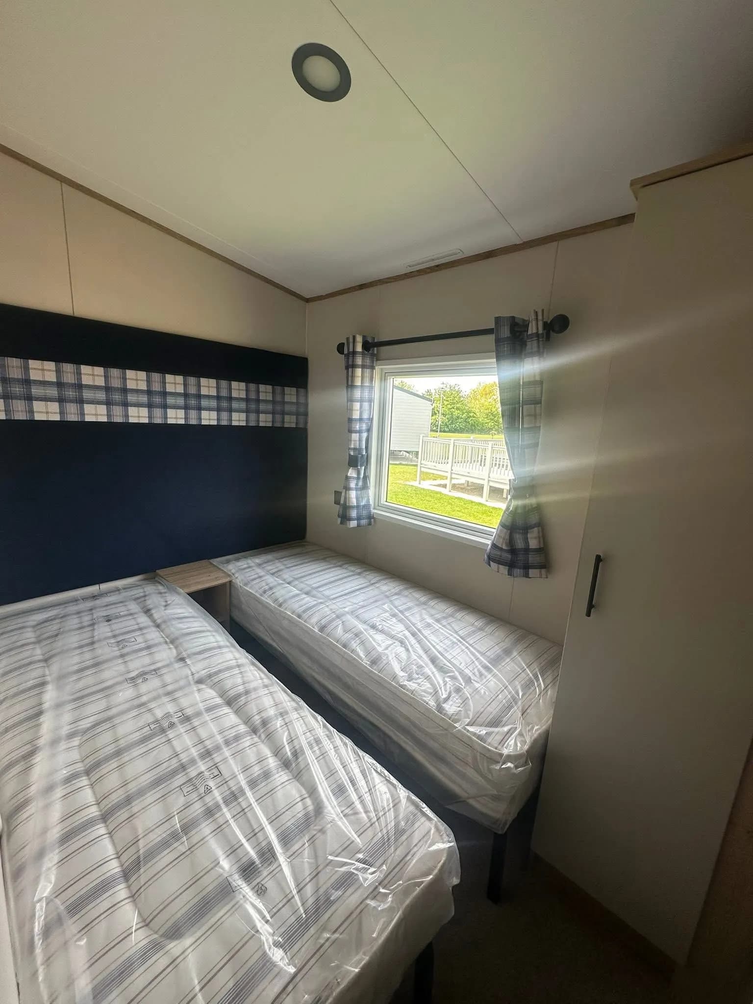 Twin bedroom inside the 2026 ABI Louis holiday home