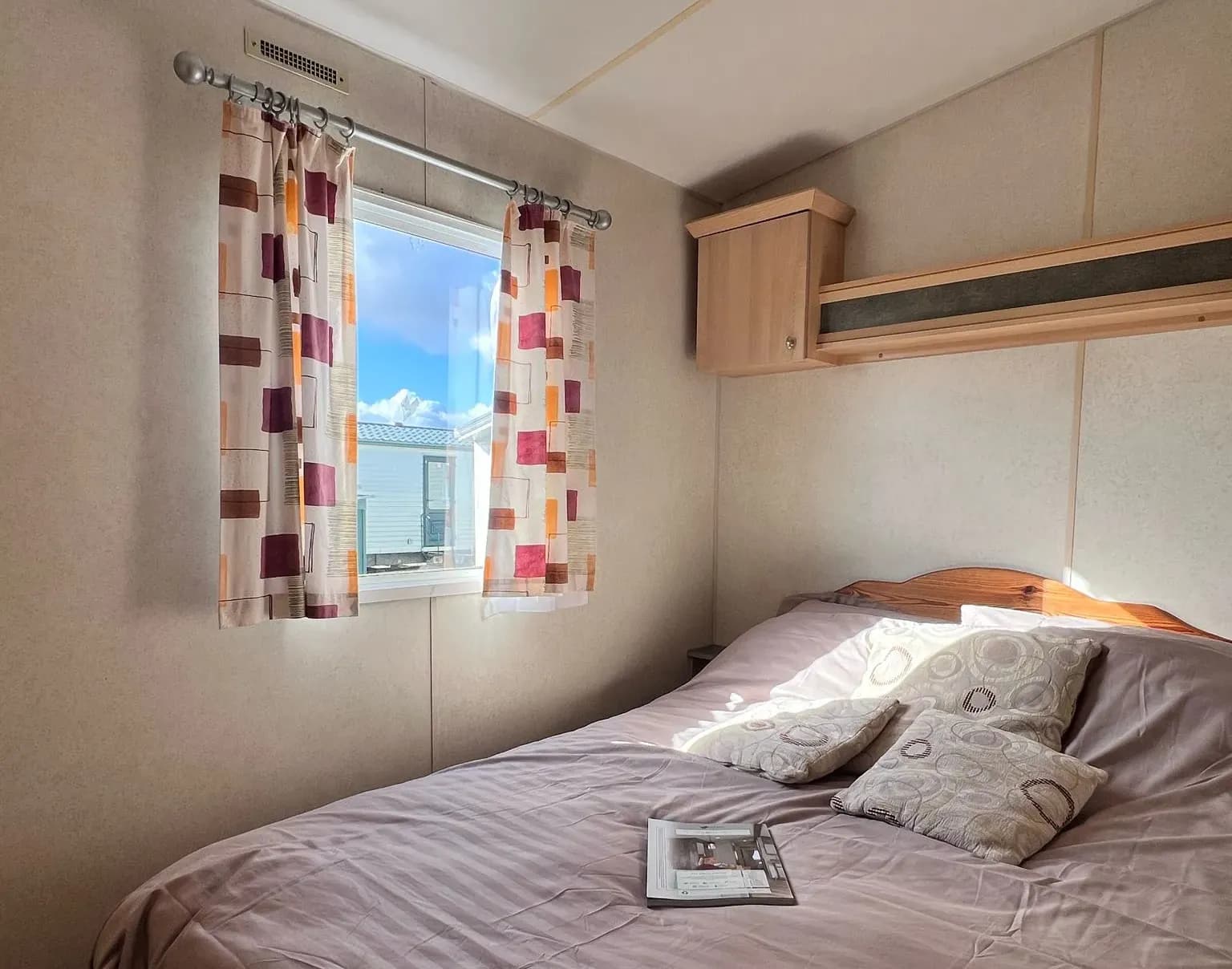 Master bedroom in the 2004 Atlas Oasis 2-bedroom caravan