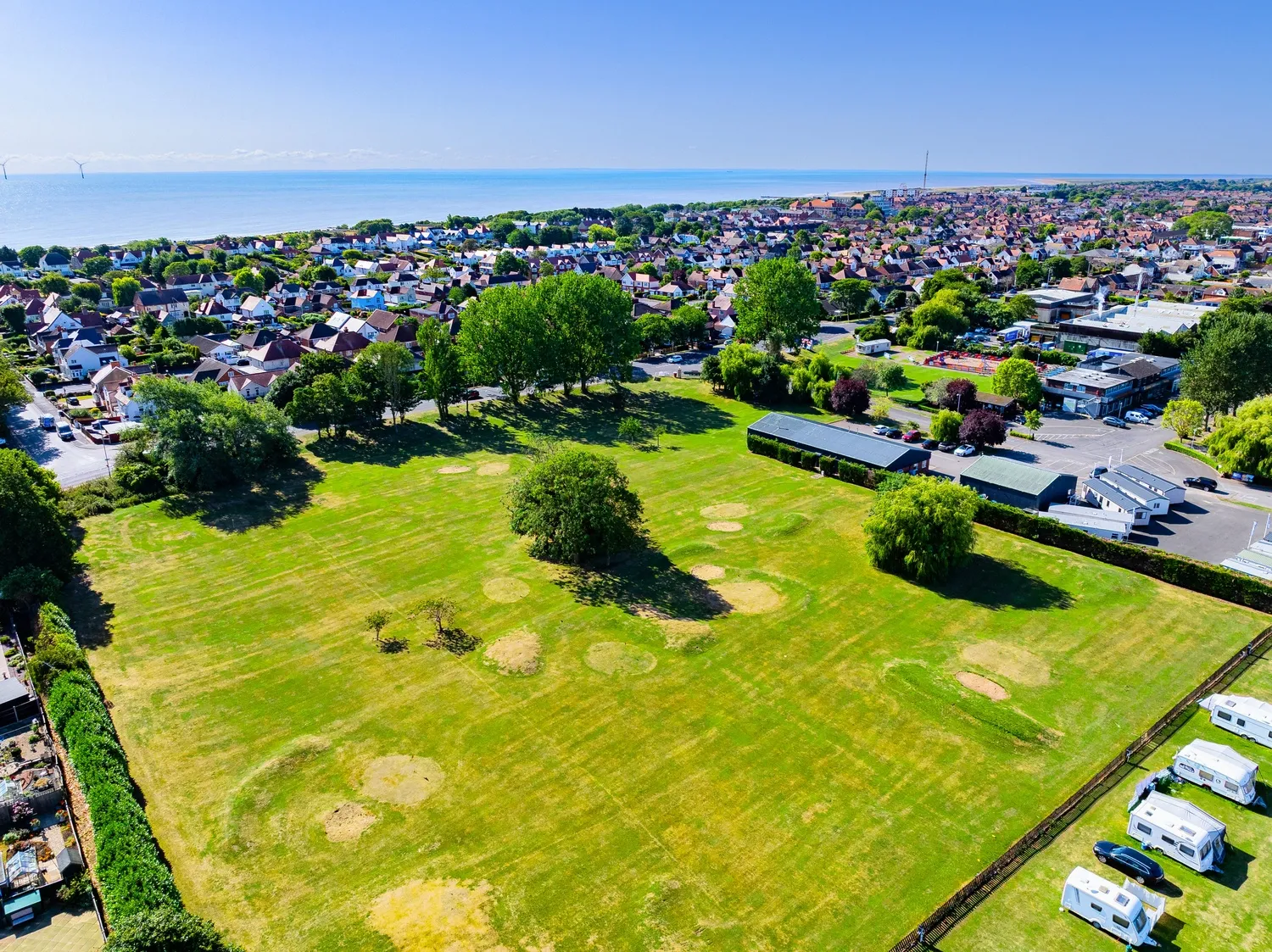 North Shore Aerial Golf Course with Ocean in Background
