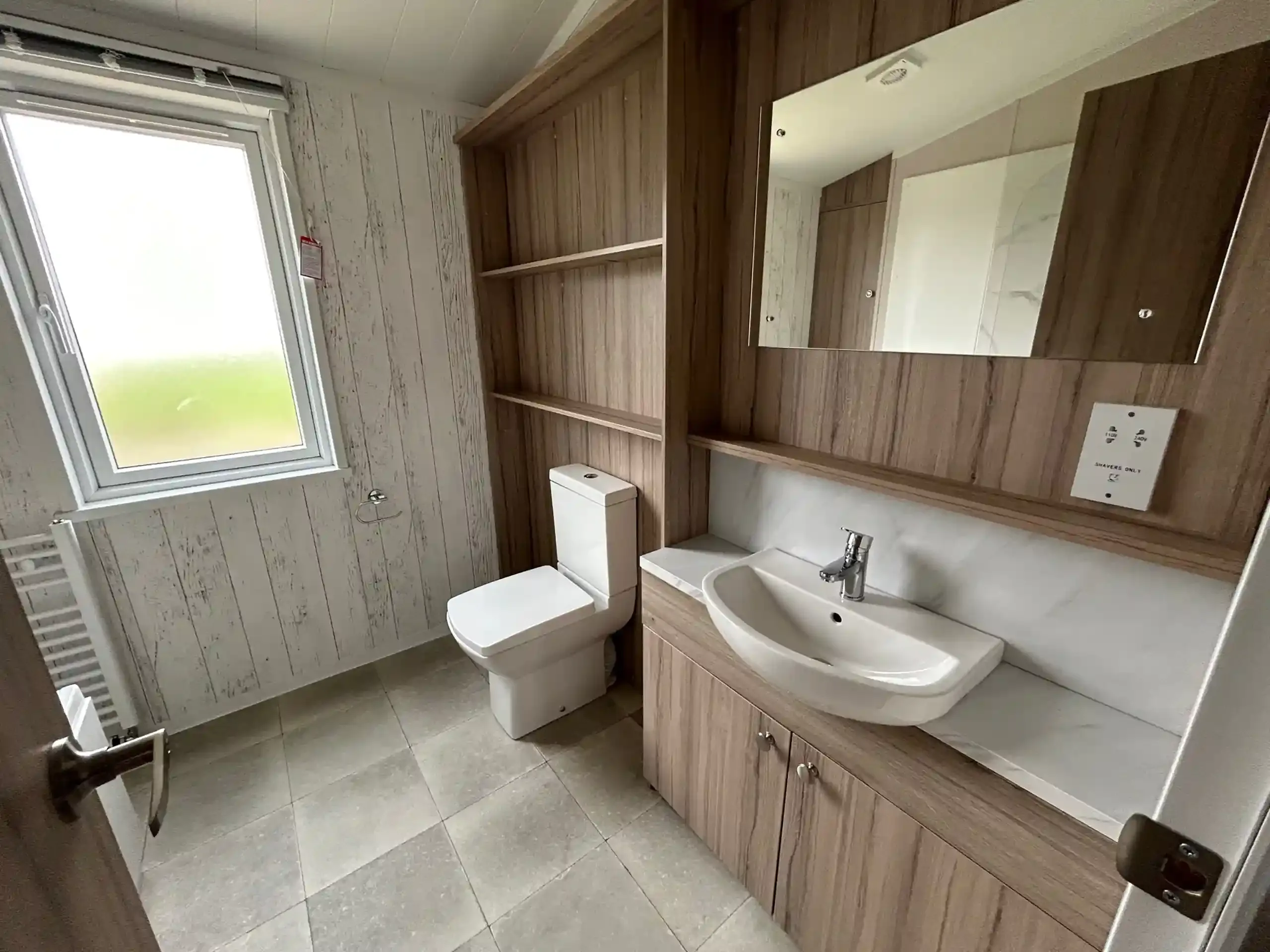 Contemporary family bathroom in the 2023 Swift Edmonton lodge
