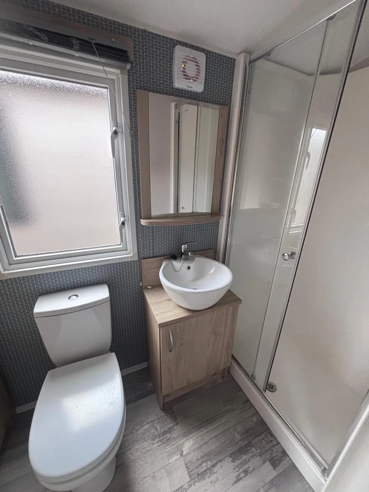 Bathroom: Modern family shower room inside the 2022 Atlas Mirage.