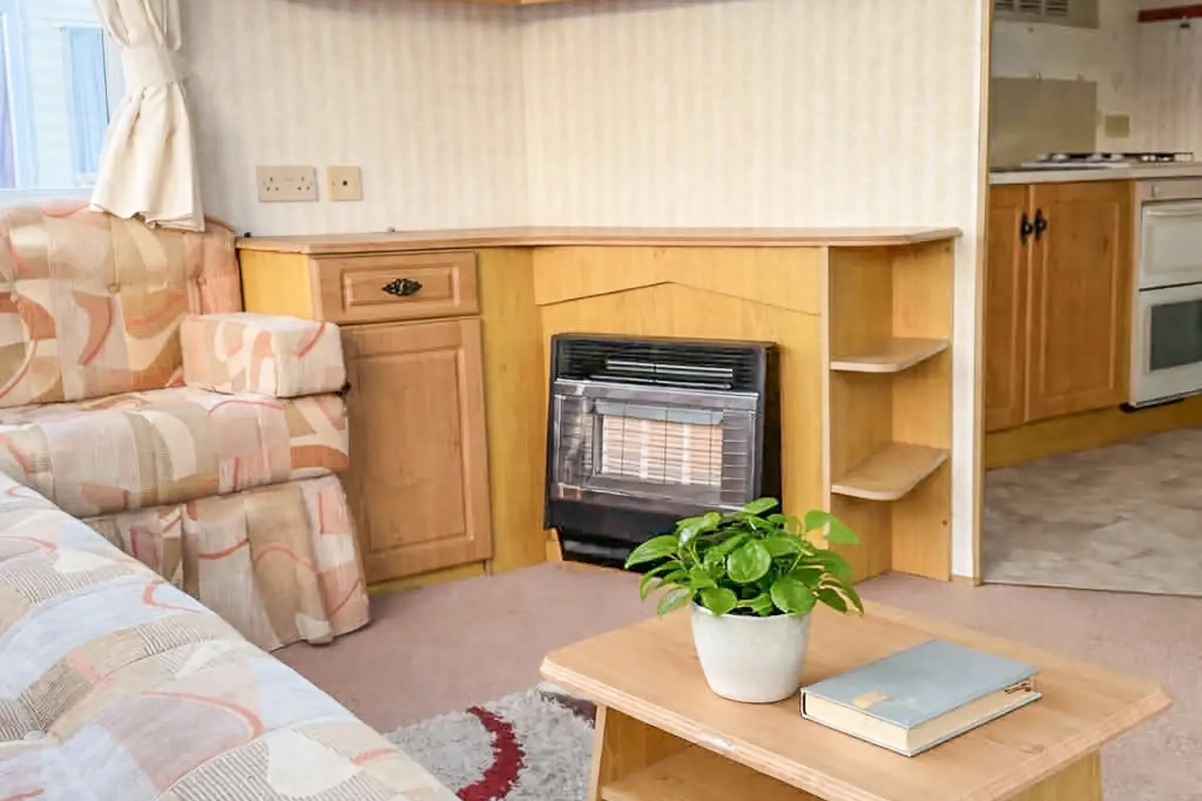 Coastfields 2000 Cosalt Torino Plus lounge with wraparound seating and fireplace