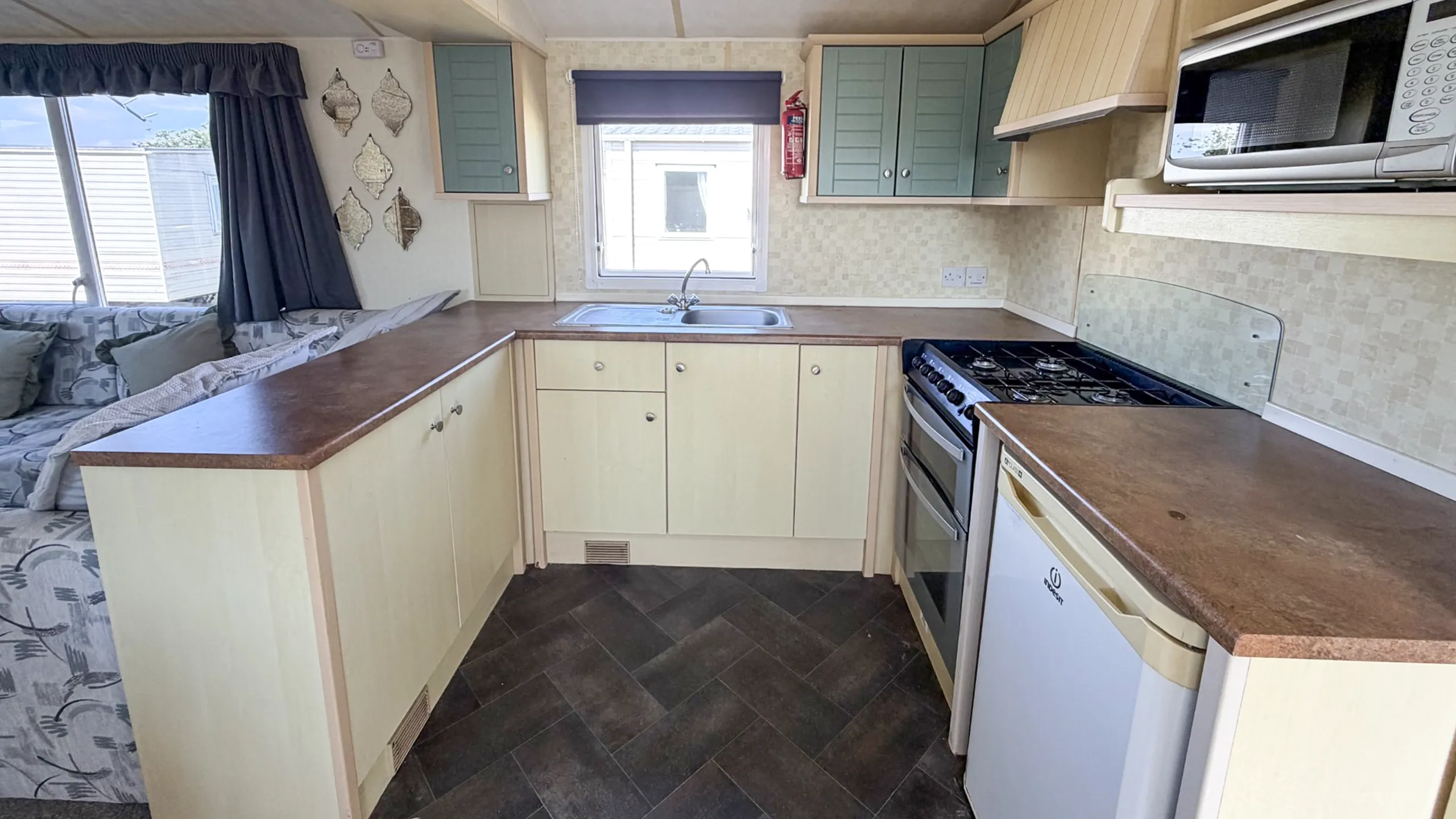 Well-planned kitchen in the 2007 Atlas Lakeland Super holiday home.
