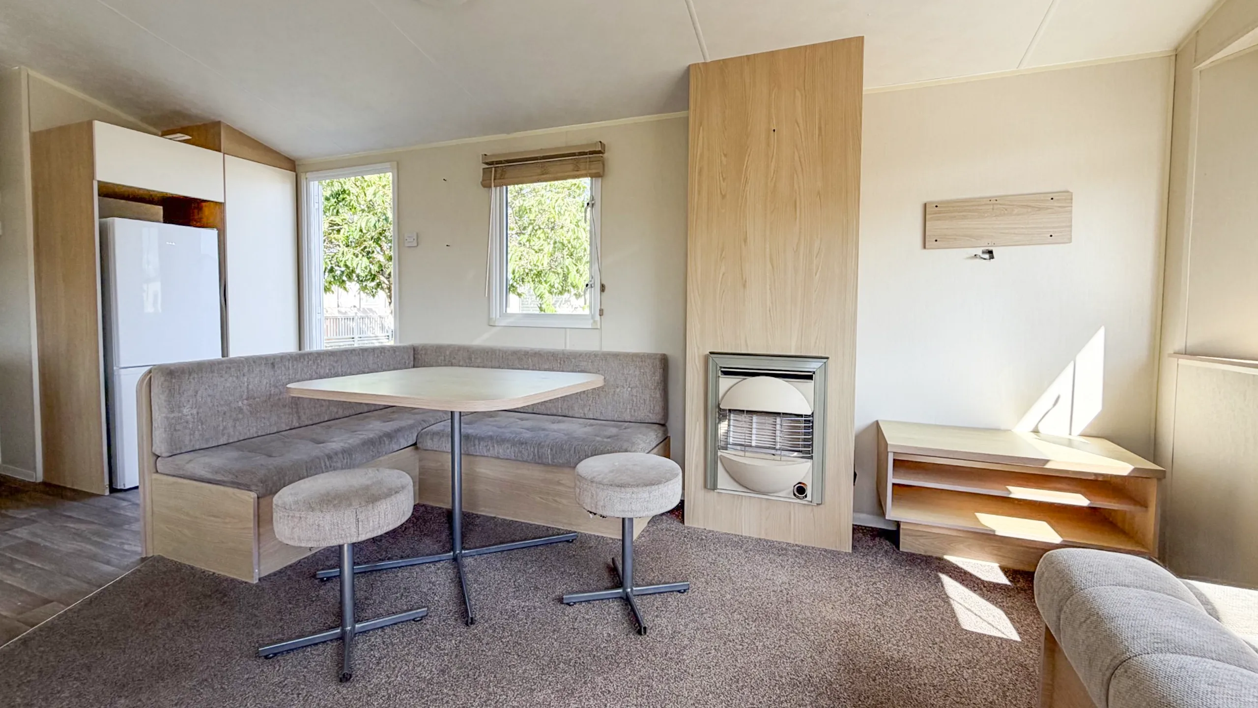 Comfortable dining area within the Willerby Aurora holiday home.