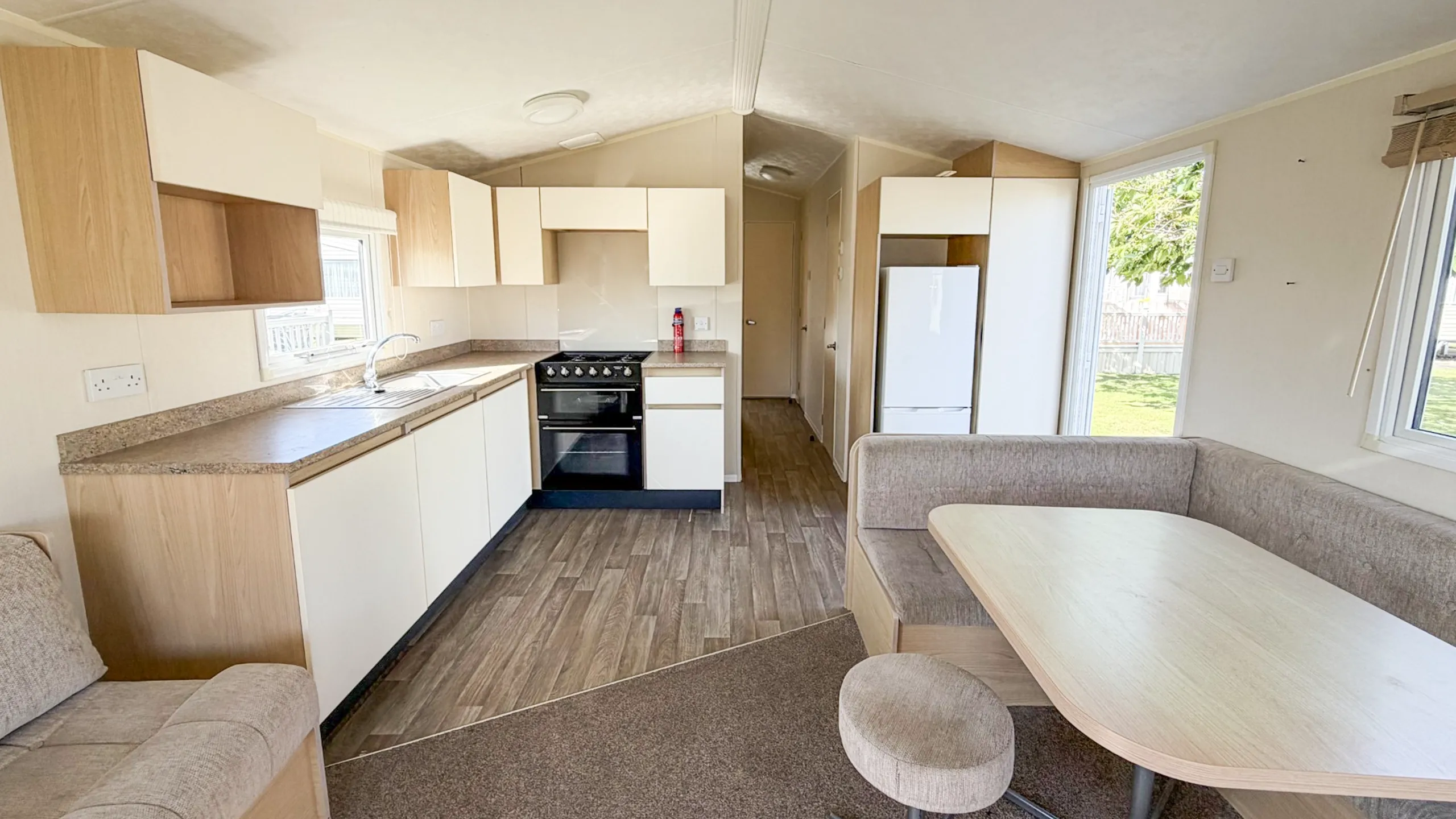 Comfortable dining area within the Willerby Aurora holiday home.