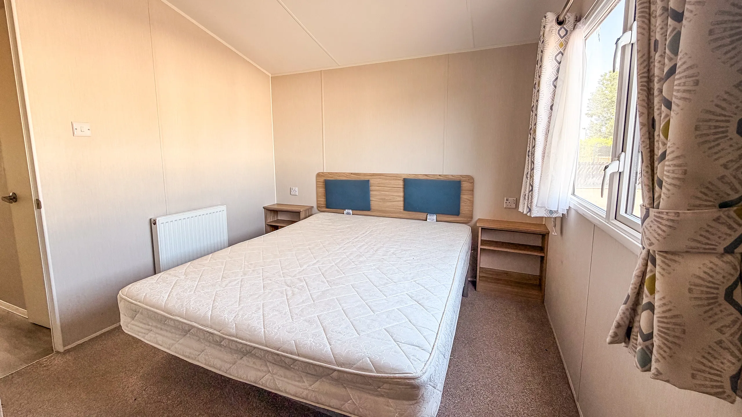 Master bedroom with walk in wardrobes in the 2021 willerby malton