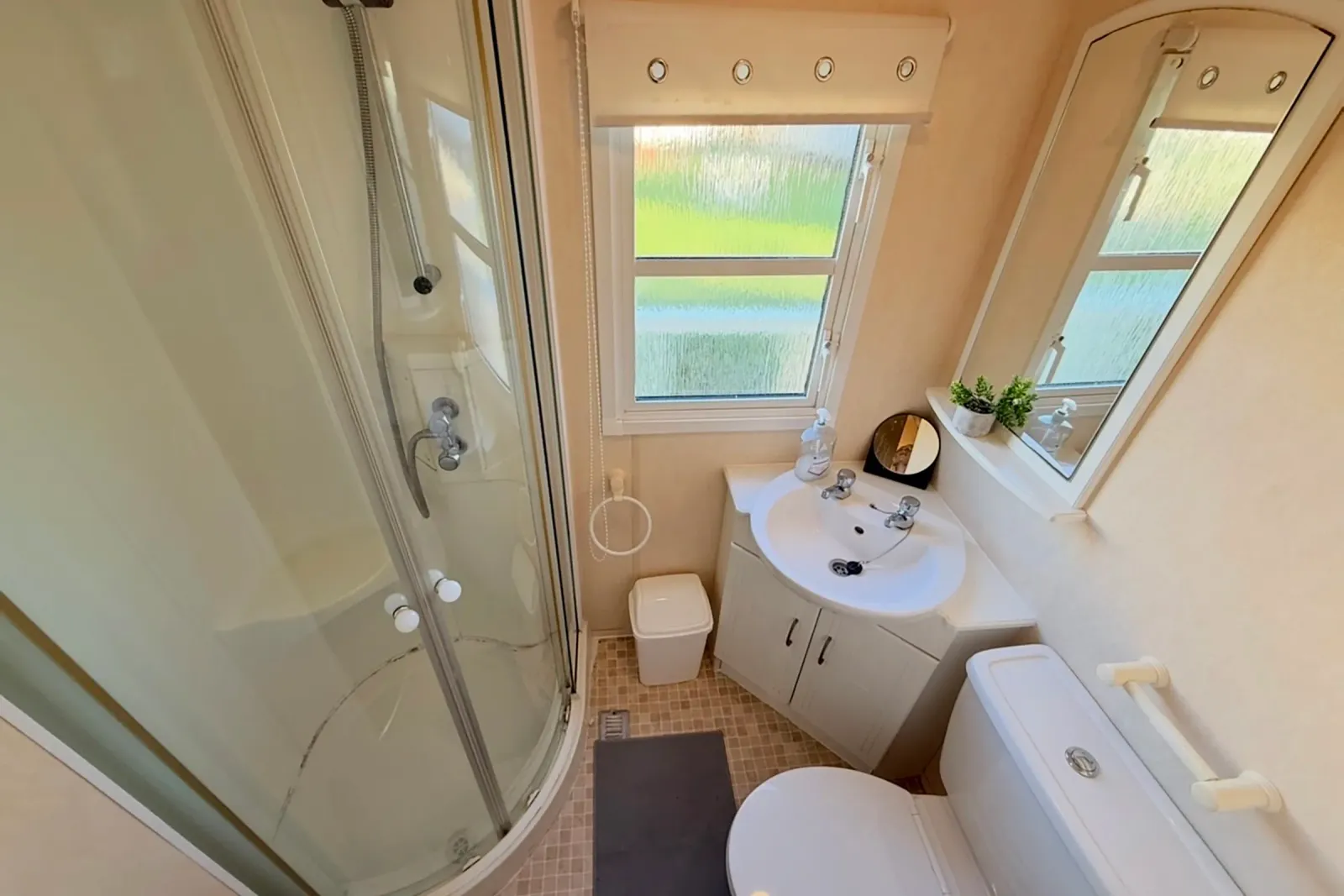 Shower room with enclosed shower, washbasin and toilet in the 2004 Atlas Heritage