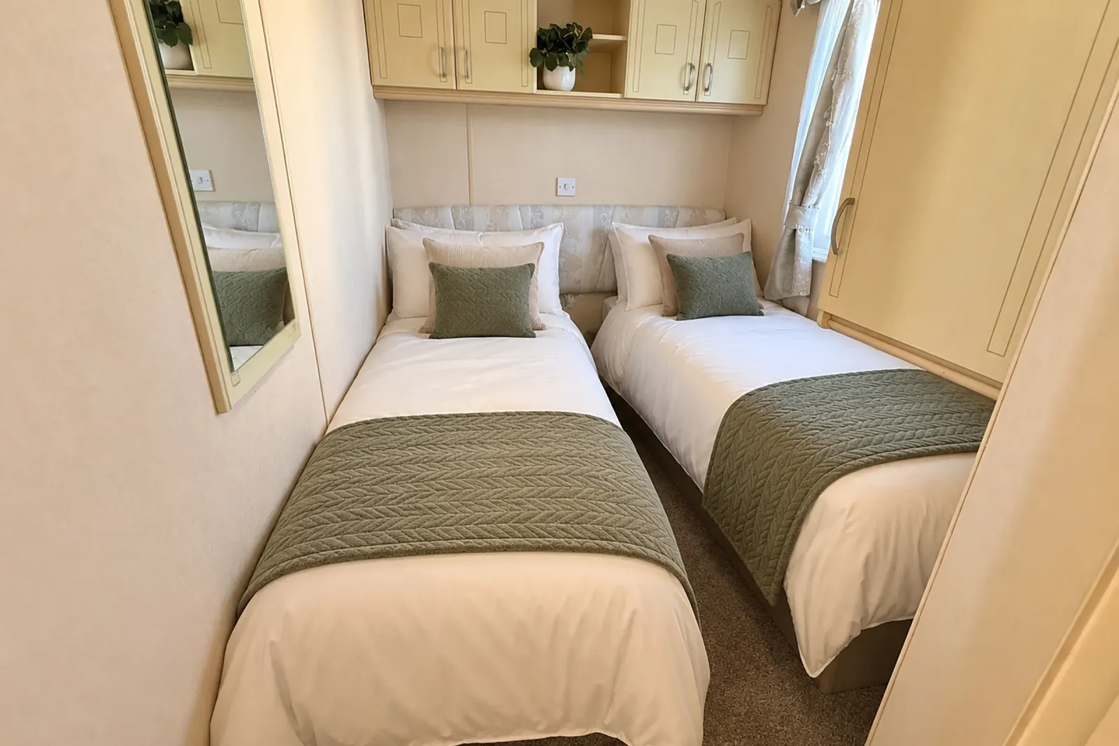 Twin bedroom with two single beds in the 2004 Atlas Heritage three-bedroom holiday home