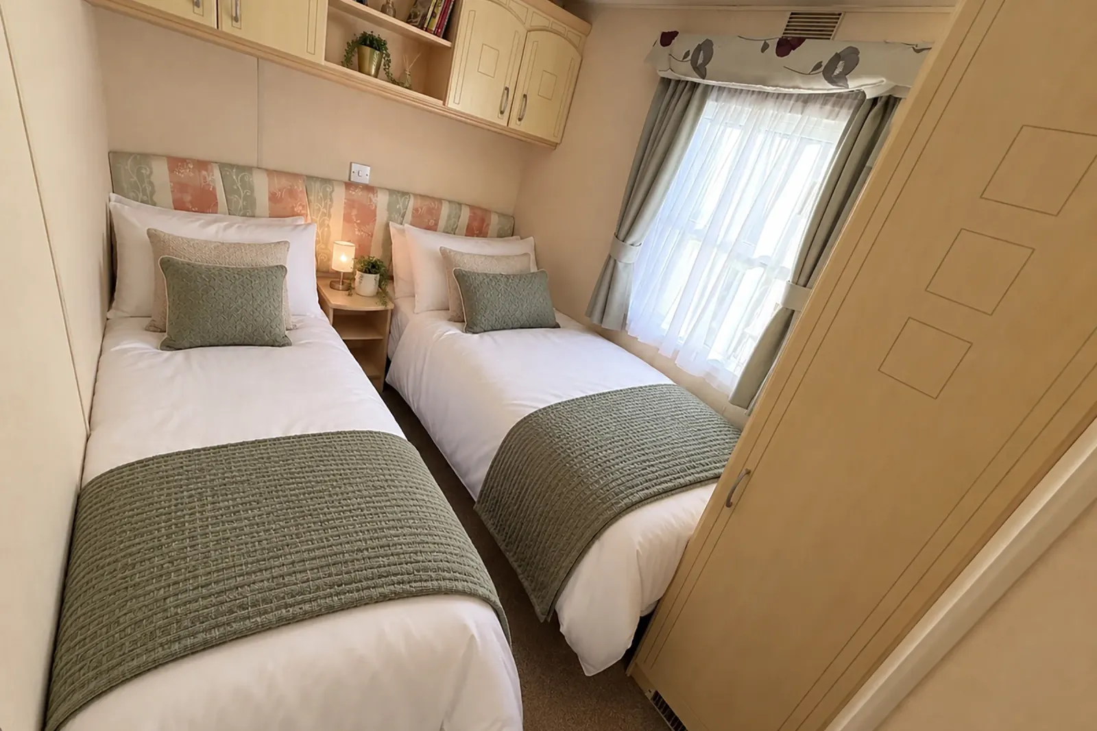 Additional bedroom with single beds in the 2004 Atlas Heritage at Coastfields Holiday Village